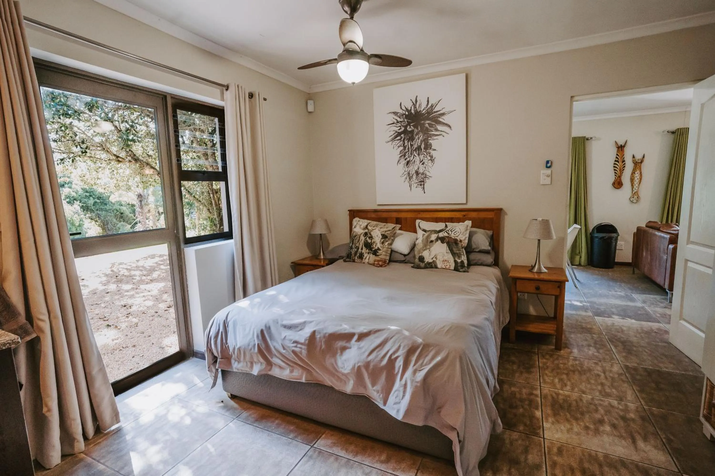 Photo of the whole room, Bed in Thunzi Bush Lodge