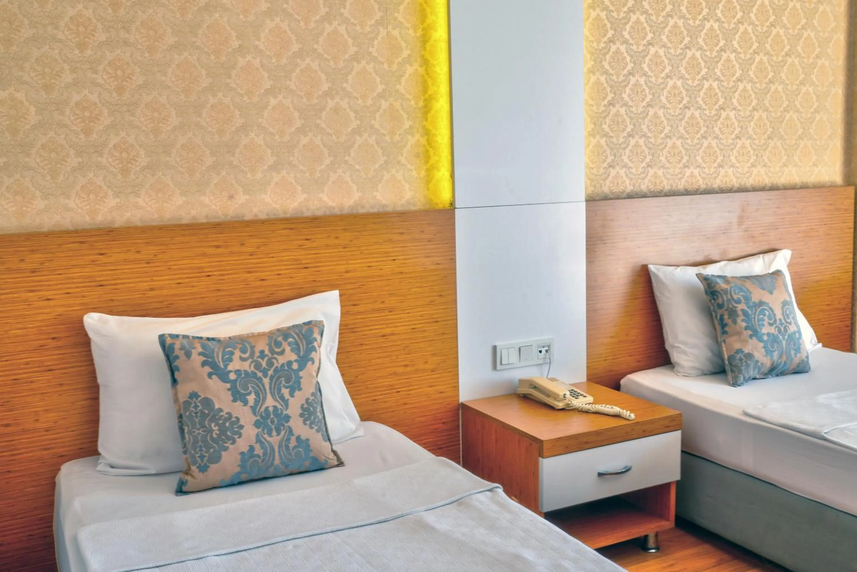 Bed in Blue Fish Hotel All Inclusive