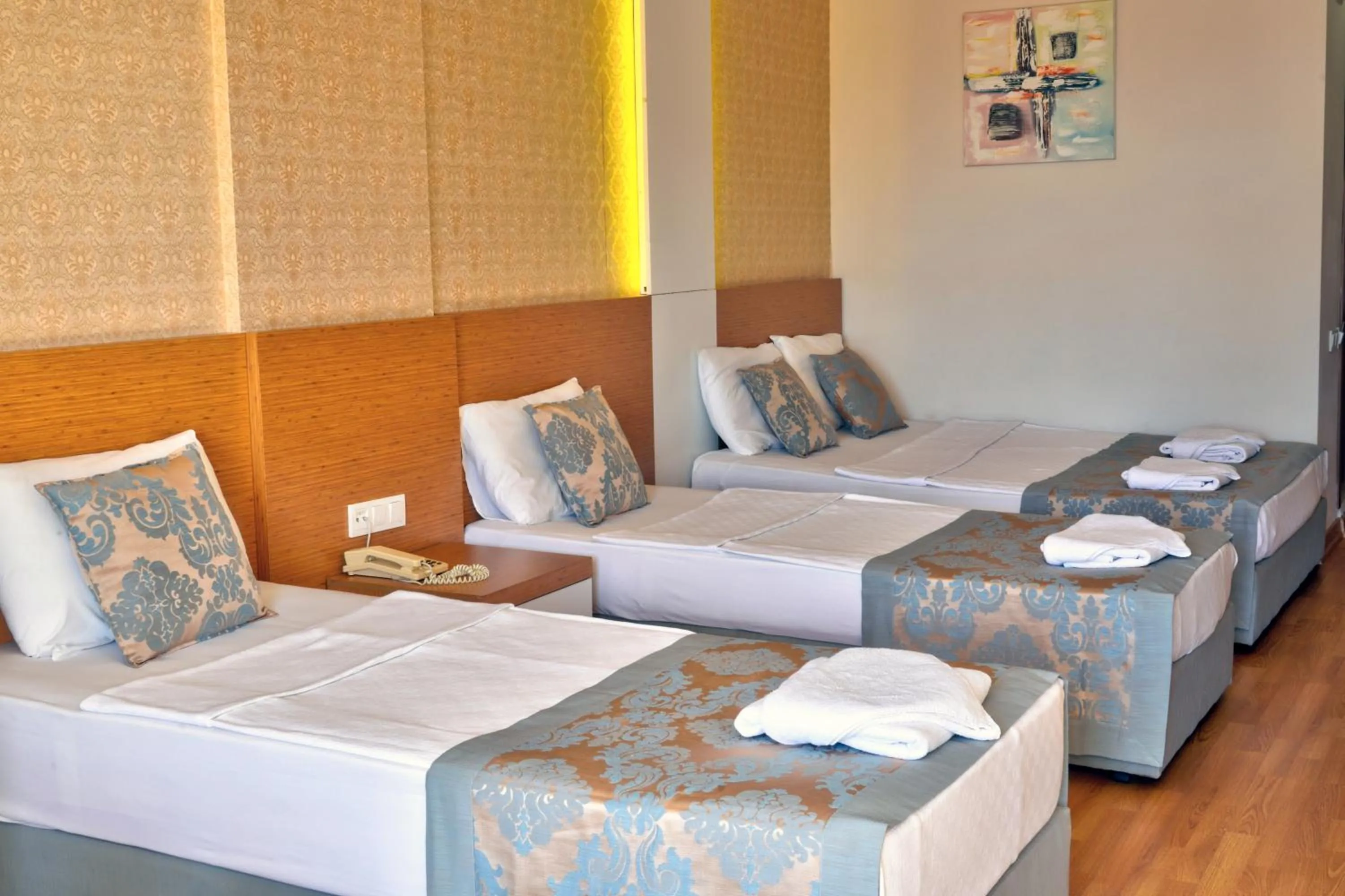 Bed in Blue Fish Hotel All Inclusive