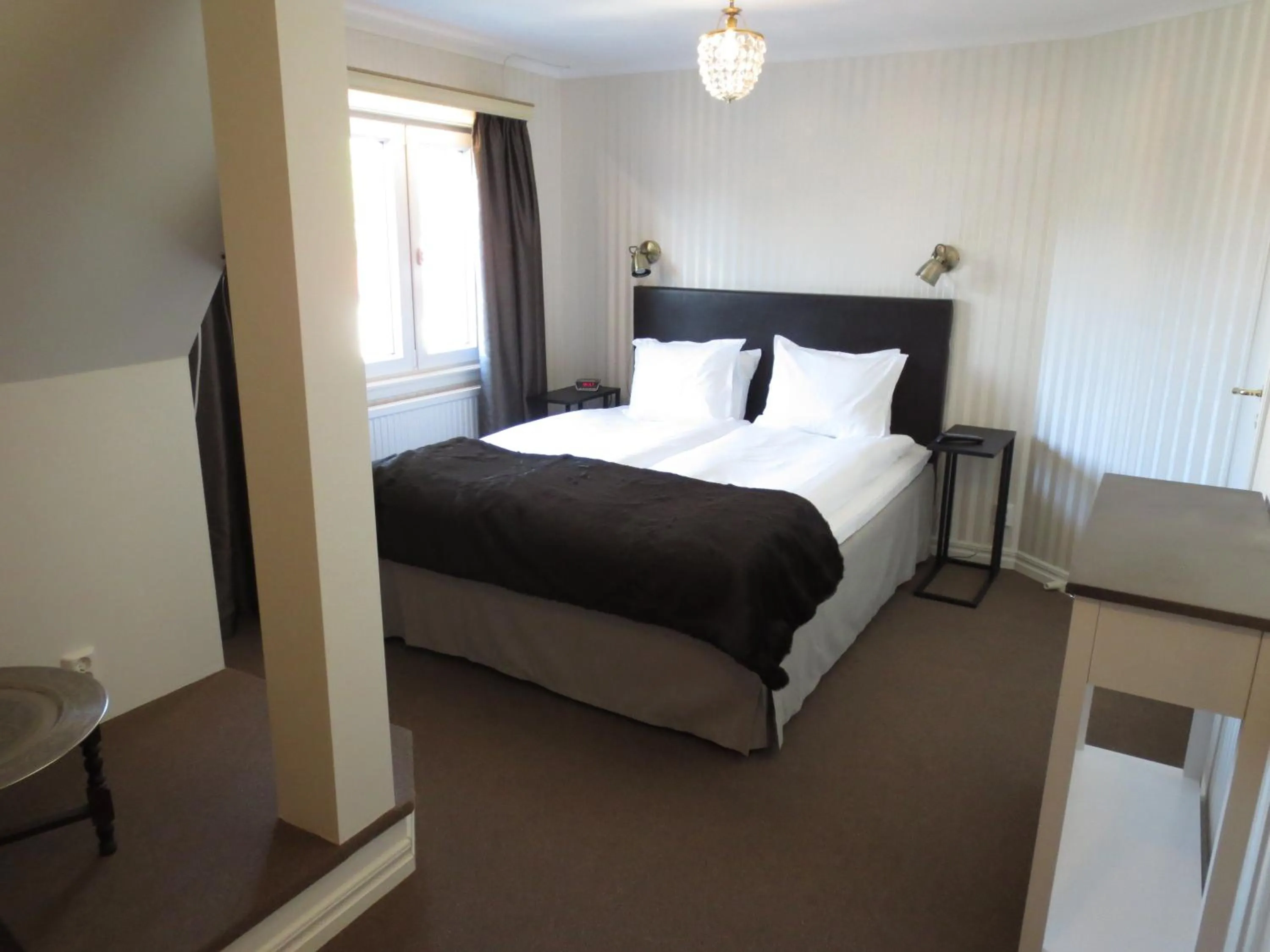 Photo of the whole room, Bed in Hotell S:t Olof