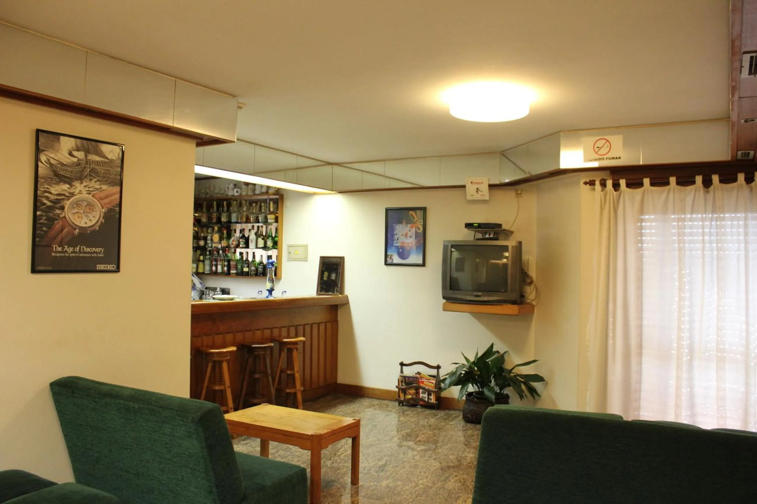 Communal lounge/ TV room in Hotel Bom Sucesso