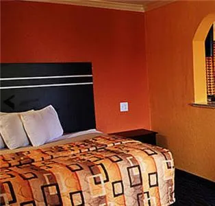 Bed in Executive inn Bacliff