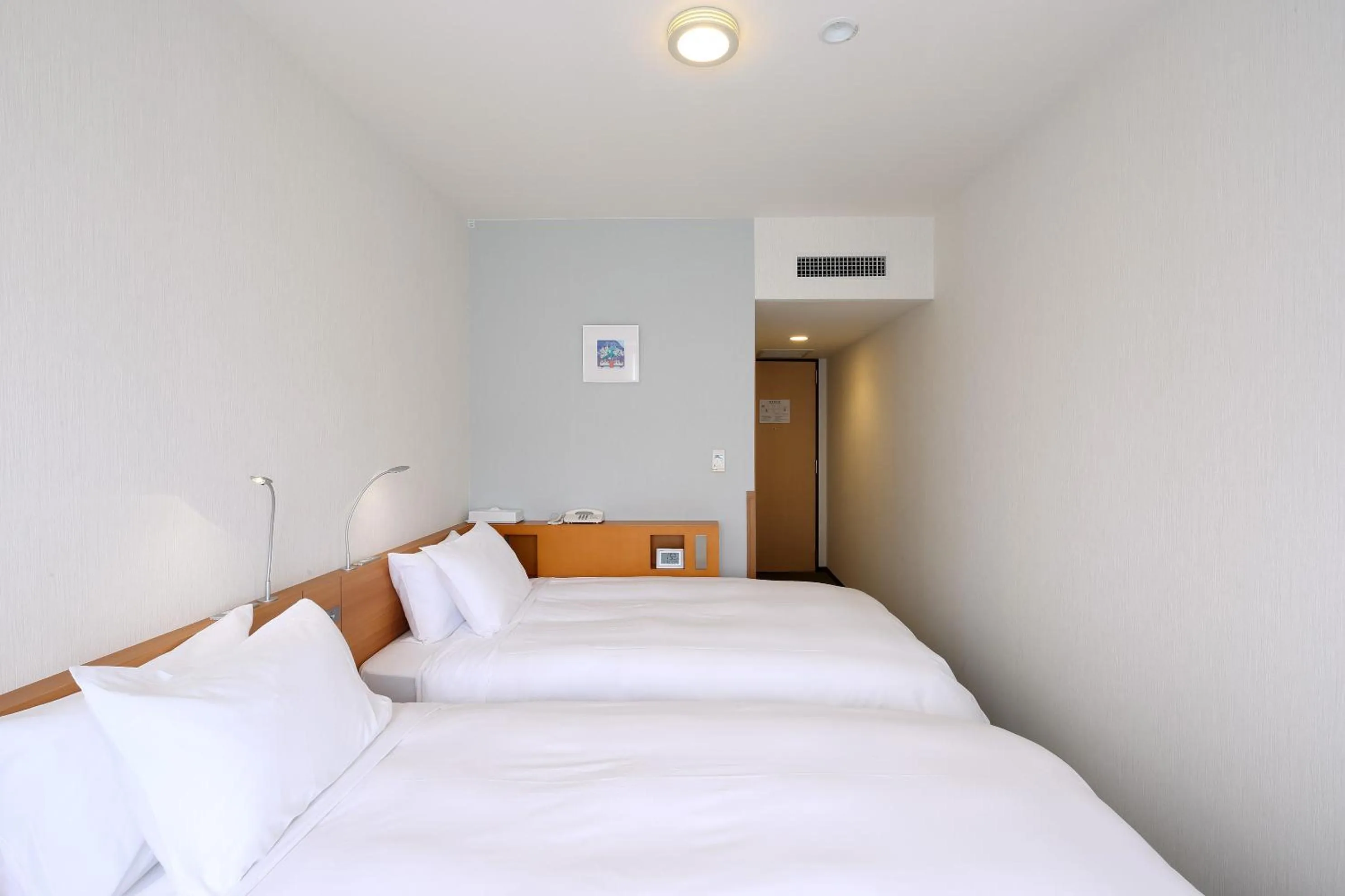 Bed in Keisei Hotel Miramare