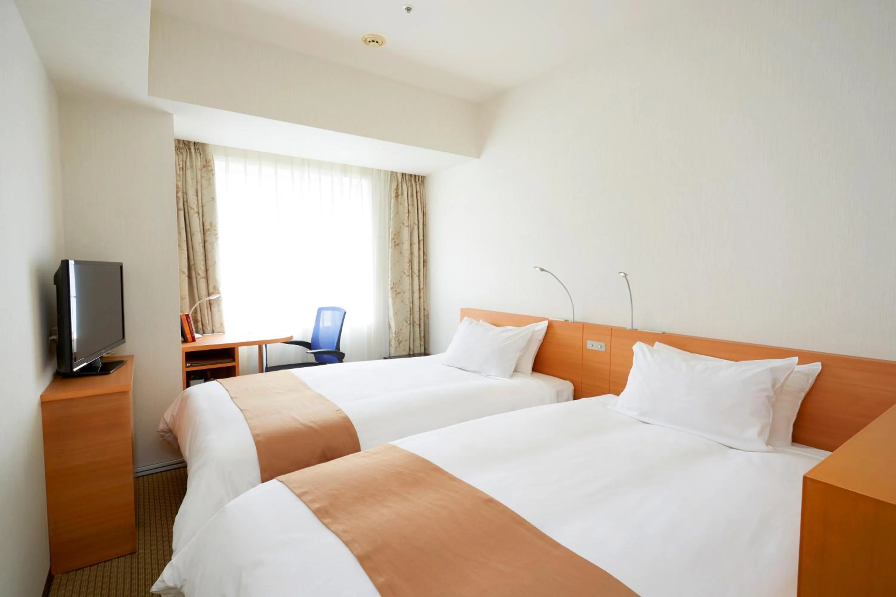 Bed in Keisei Hotel Miramare