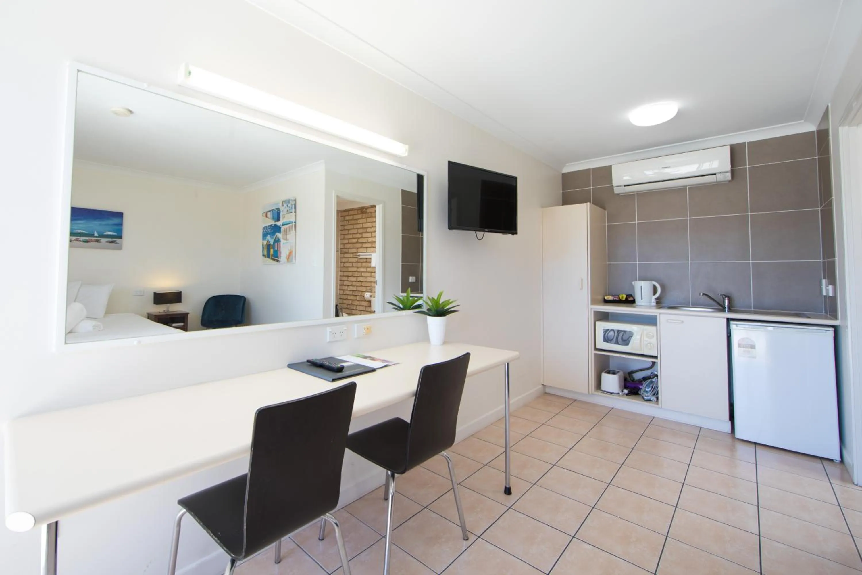 Kitchen or kitchenette in Caboolture Motel