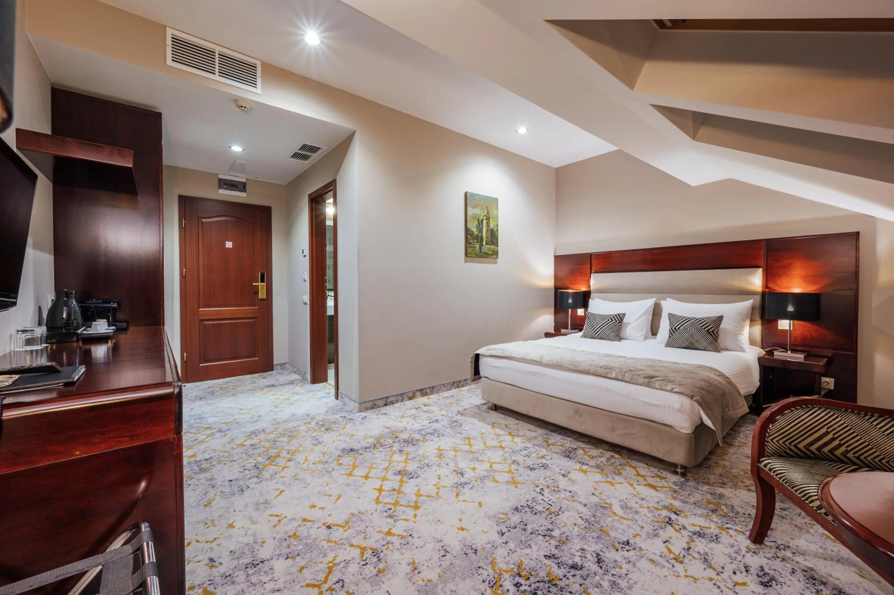 Bed in L`Art Hotel Carei