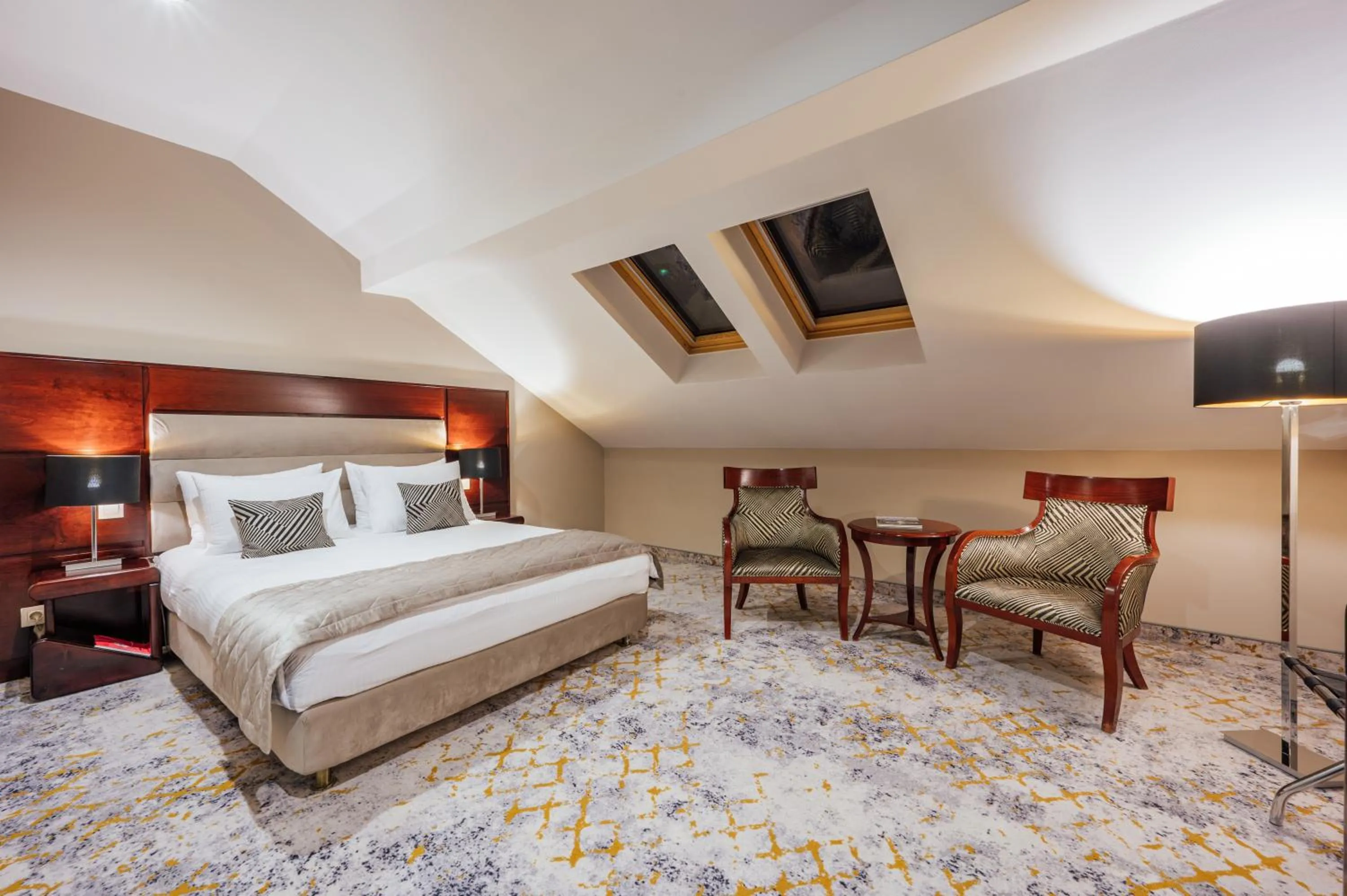 Bed in L`Art Hotel Carei