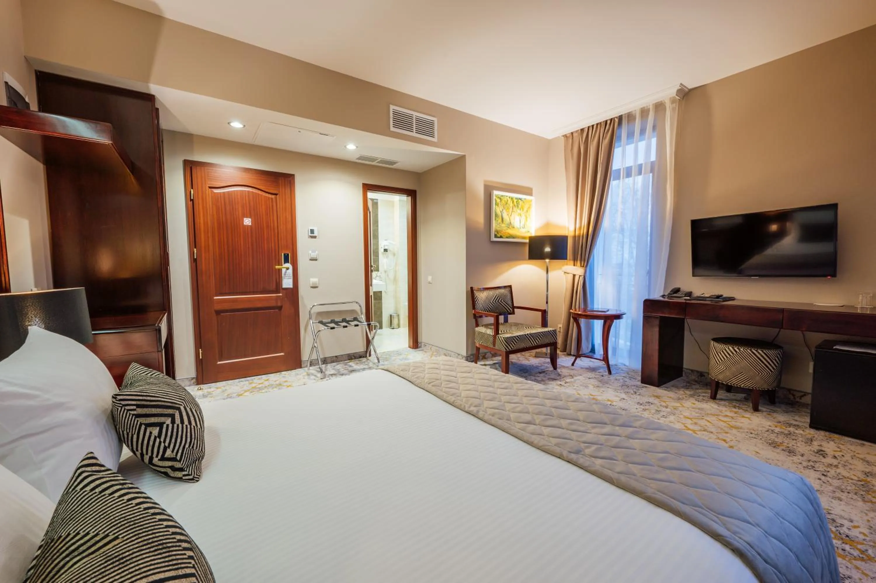 Bed in L`Art Hotel Carei