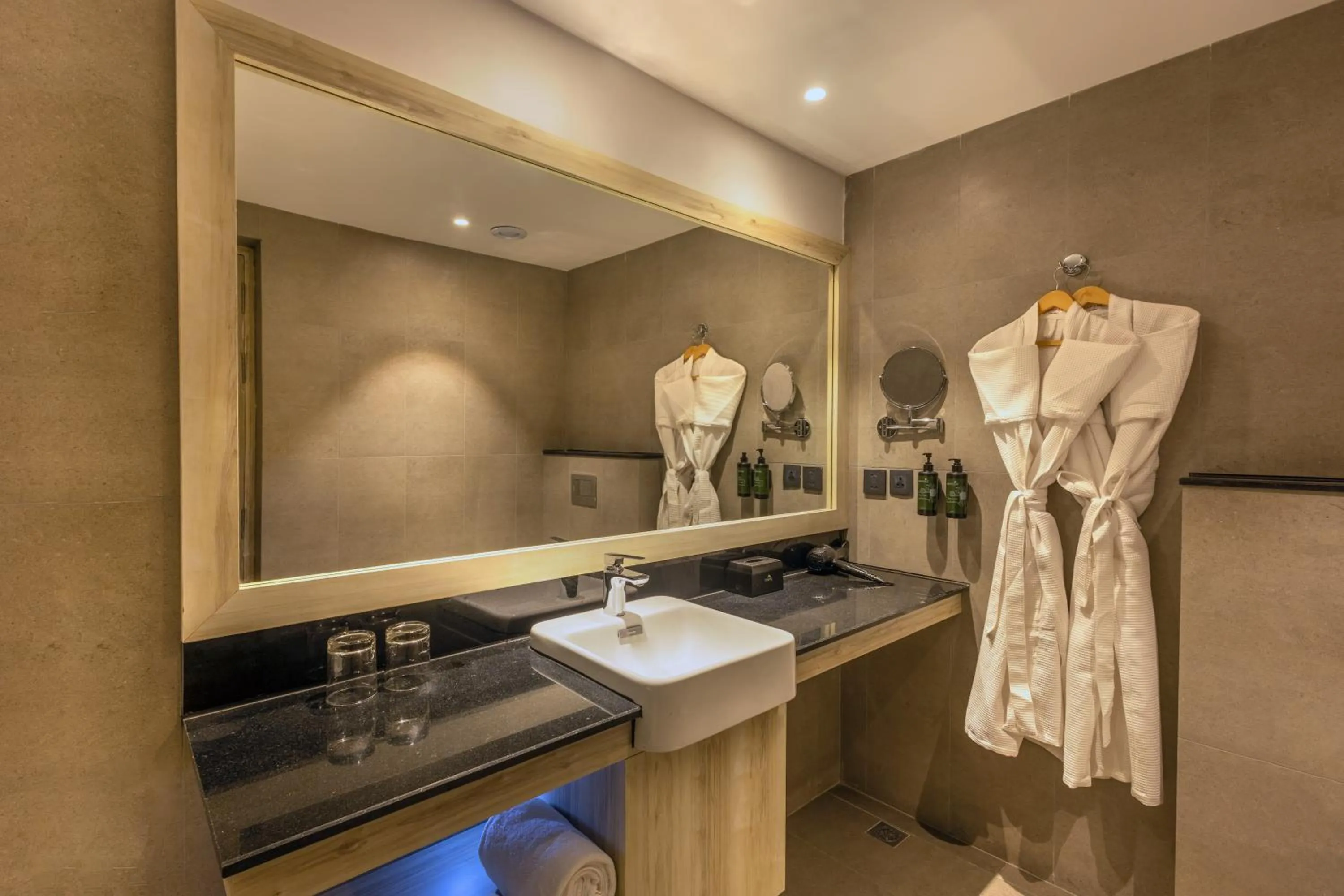 Bathroom in Ramada by Wyndham Goa Arpora