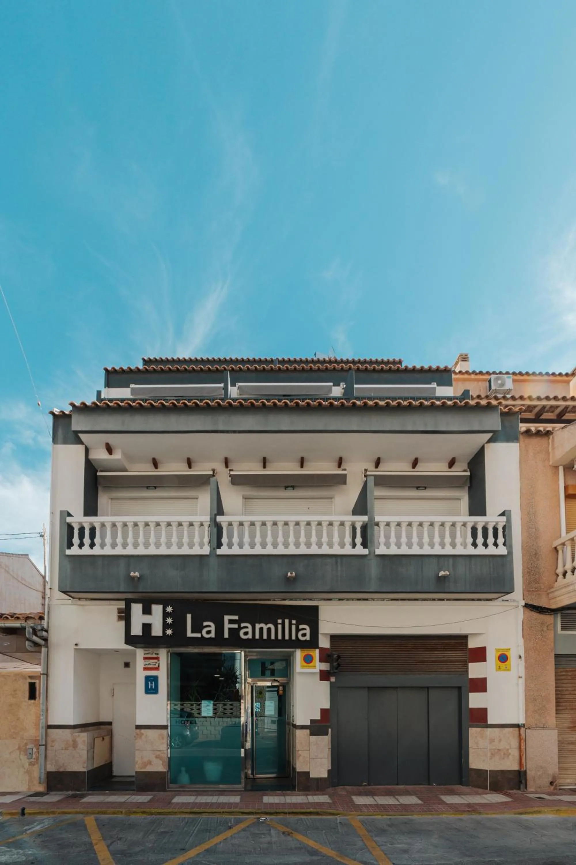 Property building in Hotel La Familia
