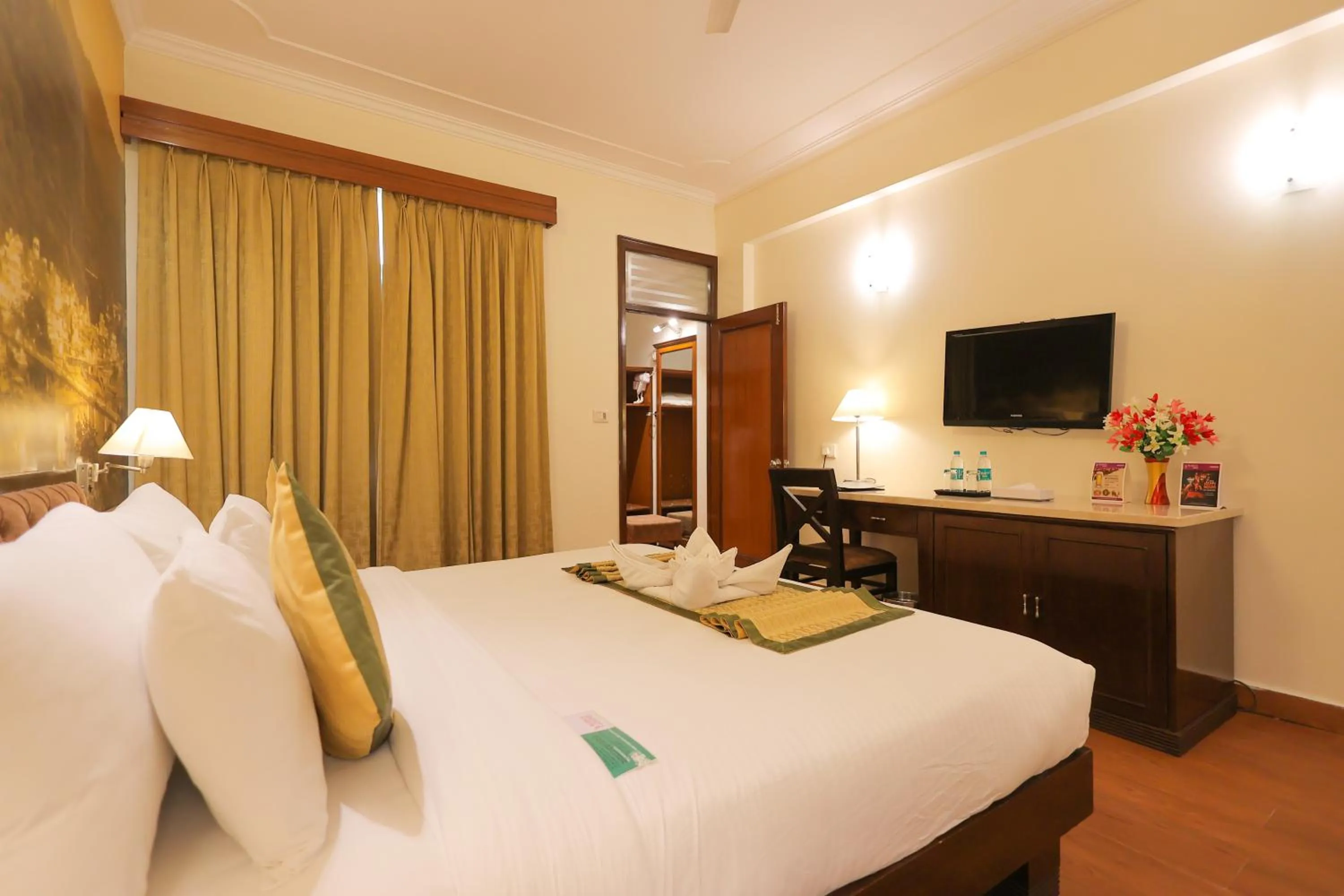 Photo of the whole room, Bed in Regenta Orko's Haridwar, Motichur , 10 min from Har ki Pauri