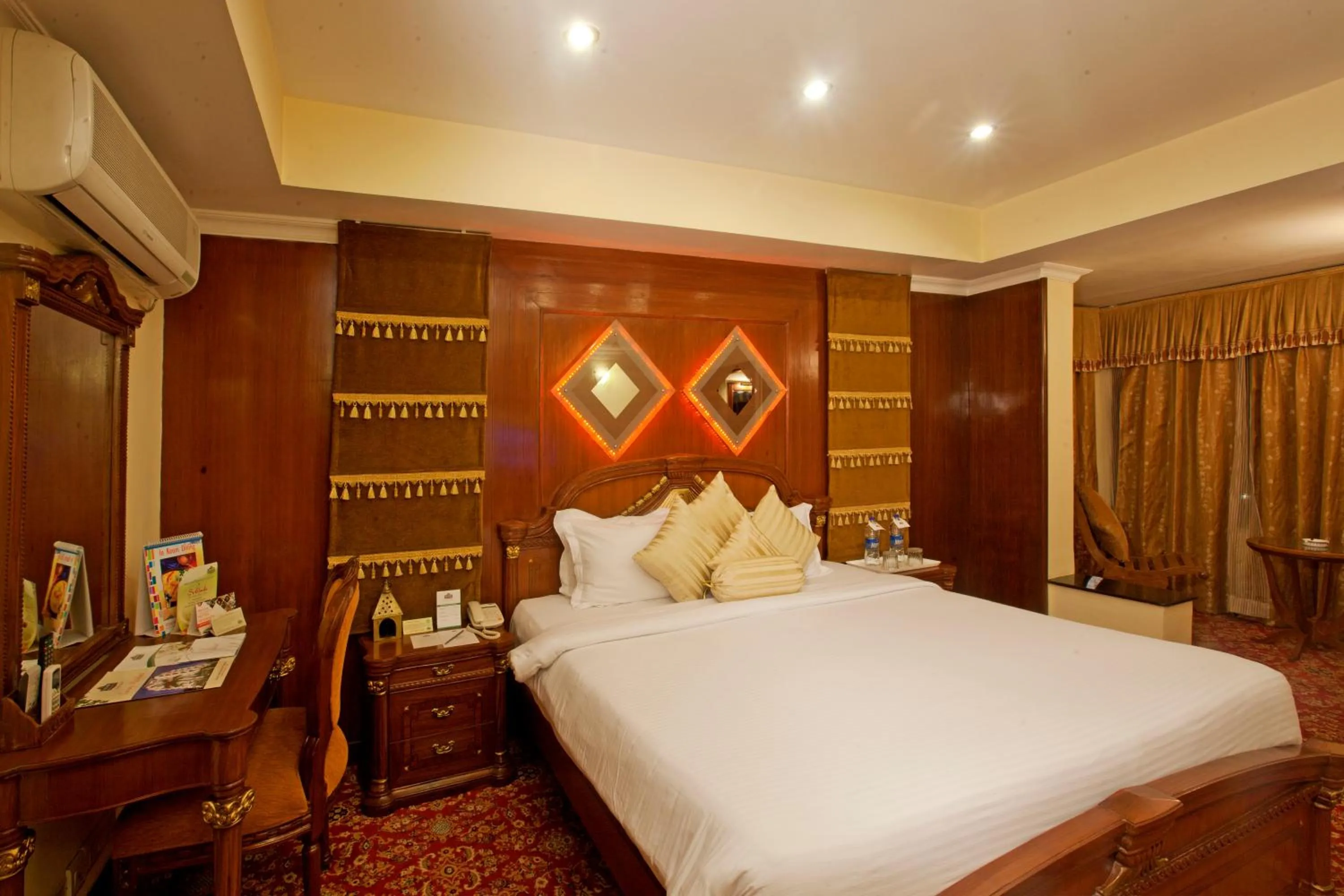 Photo of the whole room, Bed in Regenta Orko's Haridwar, Motichur , 10 min from Har ki Pauri