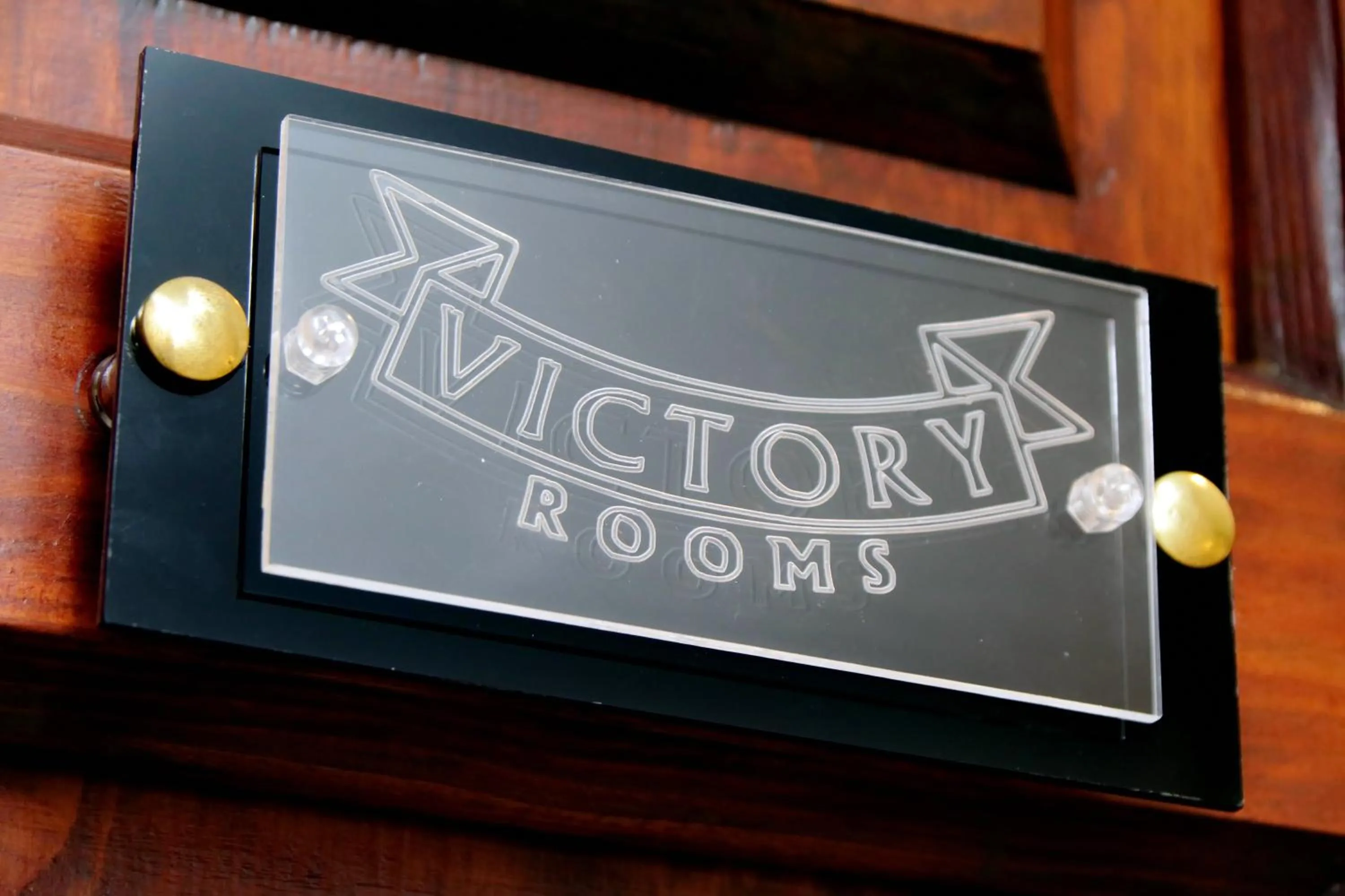 Property logo or sign in Victory Rooms