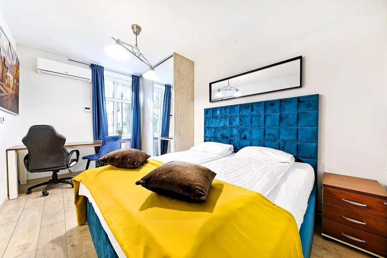 Bed in Cinema Apartments