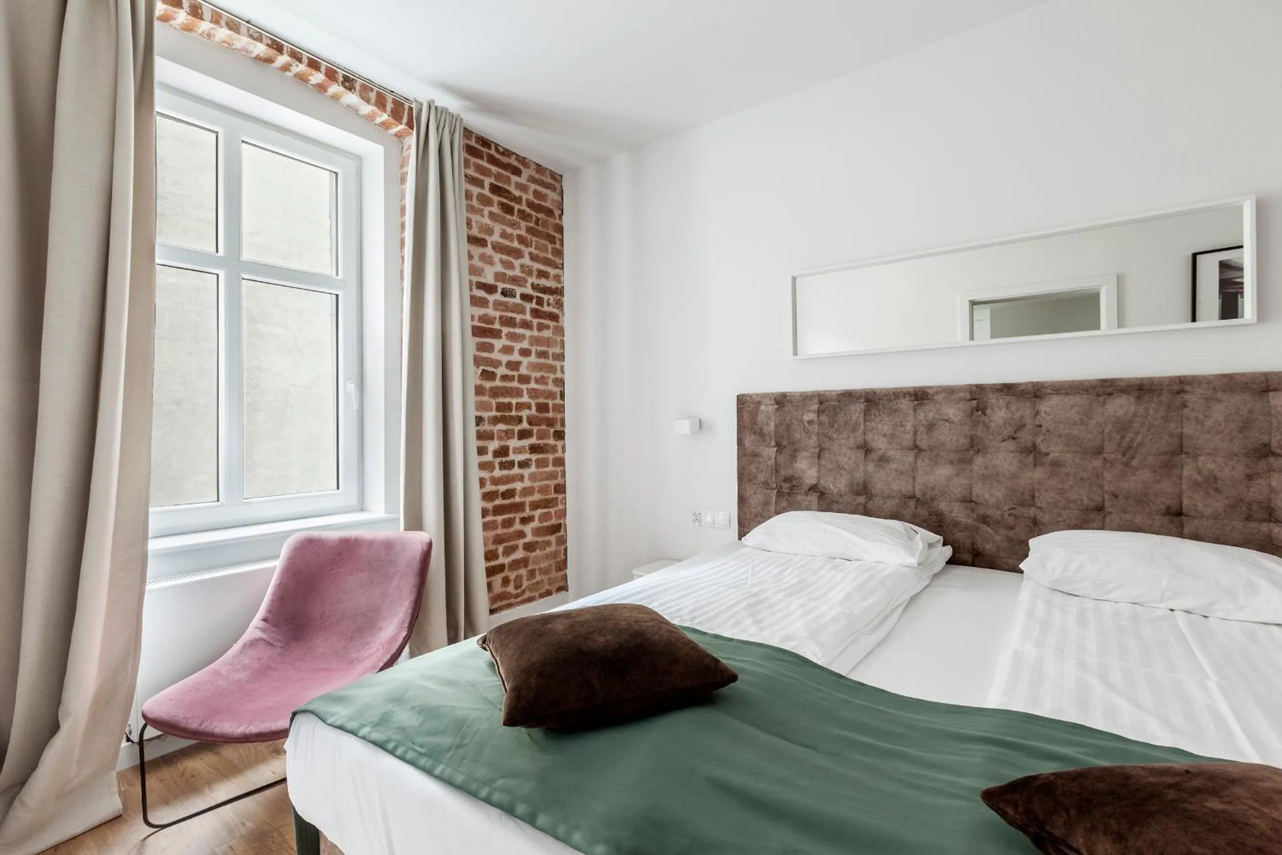 Bed in Cinema Apartments