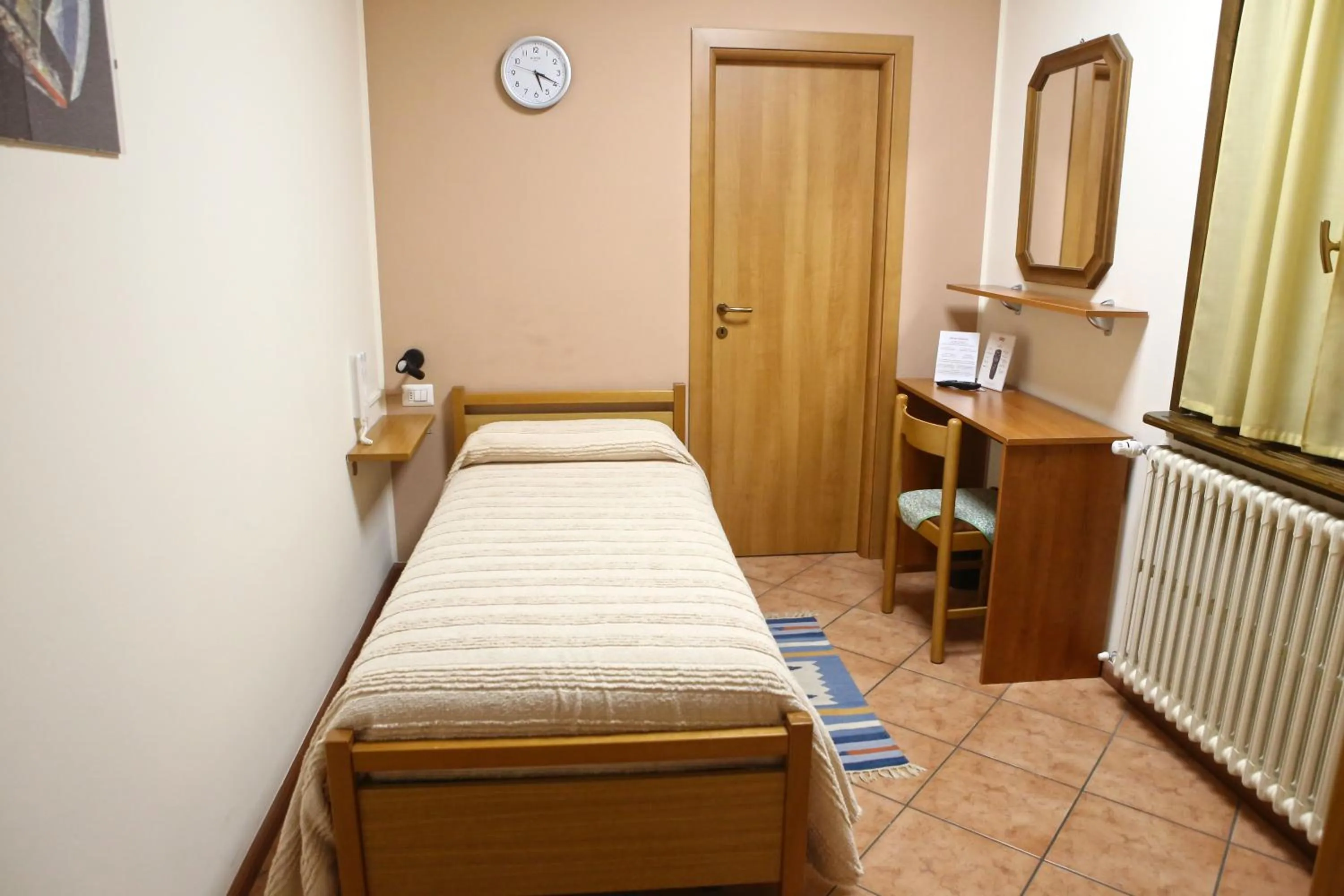 Photo of the whole room, Bed in Albergo Gusmeroli