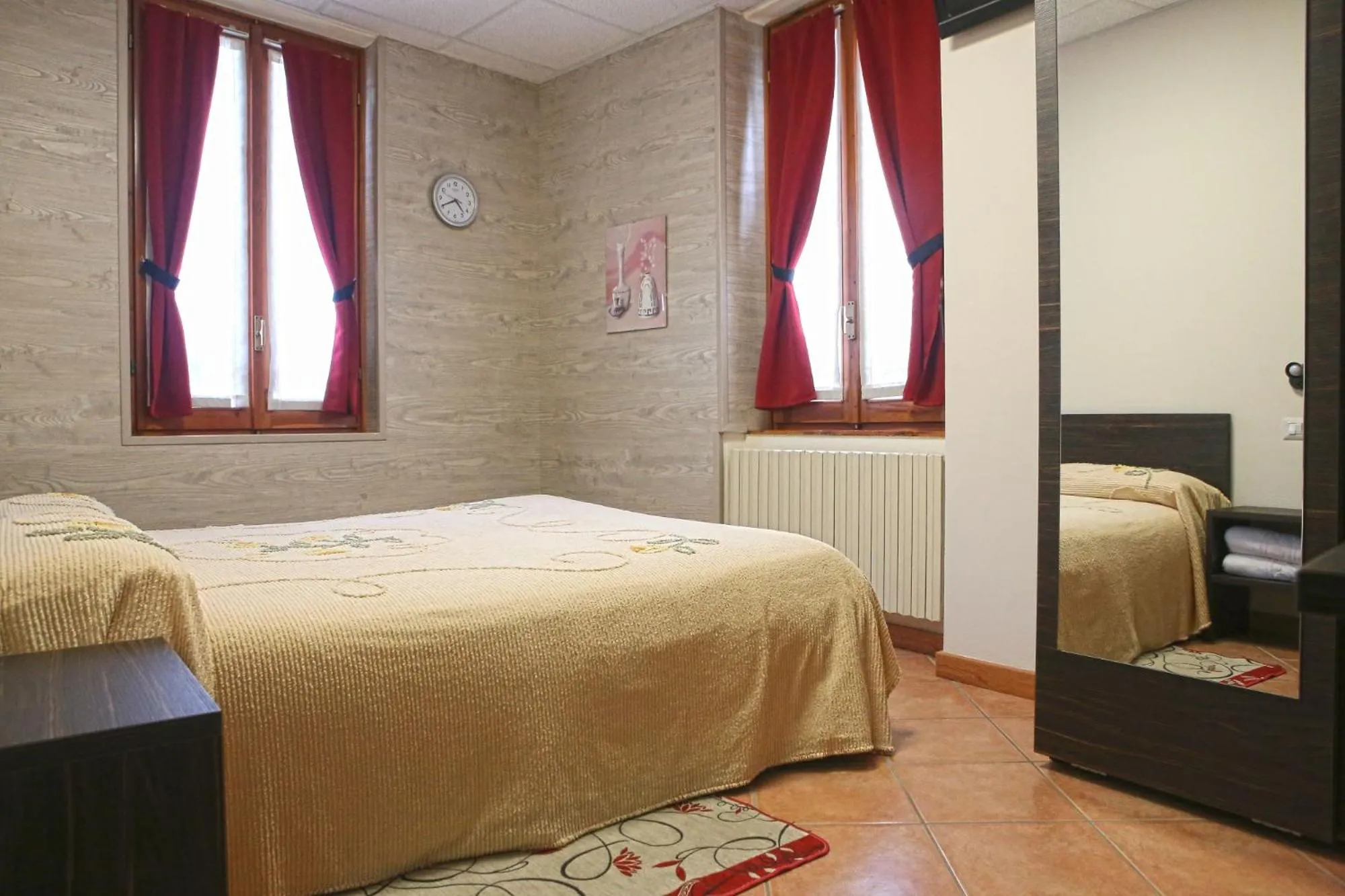 Bed in Albergo Gusmeroli