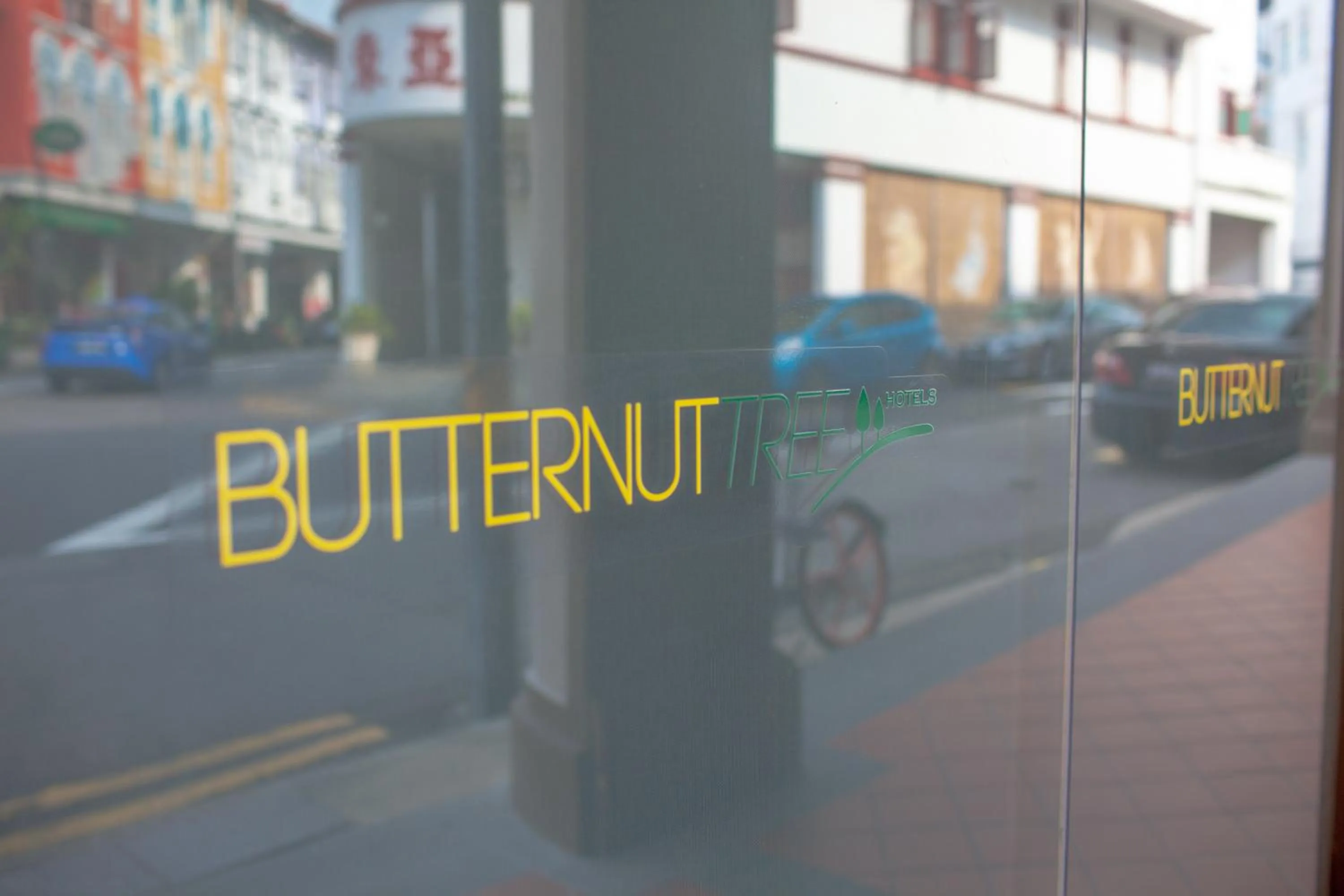 Property logo or sign in Butternut Tree Hotel