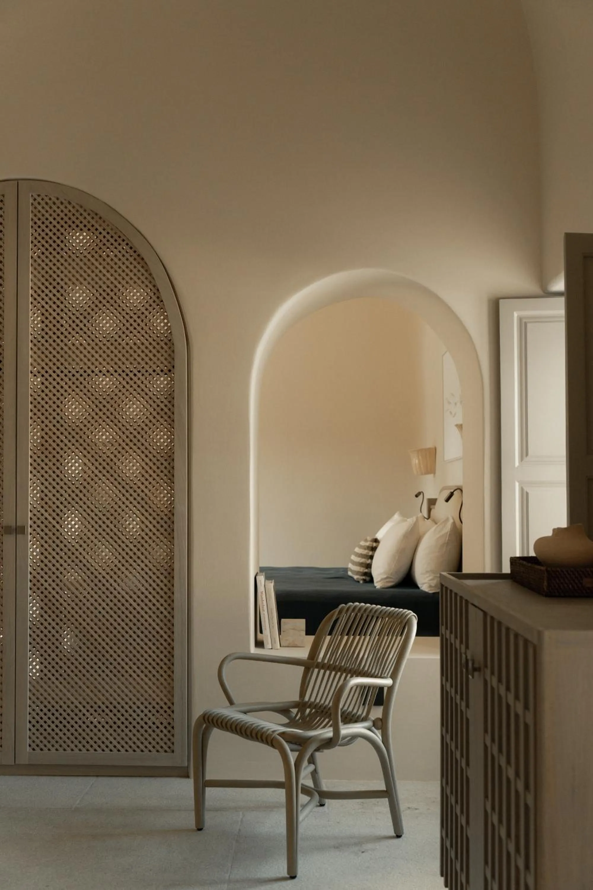 Bed in Black Rose Beach Suites