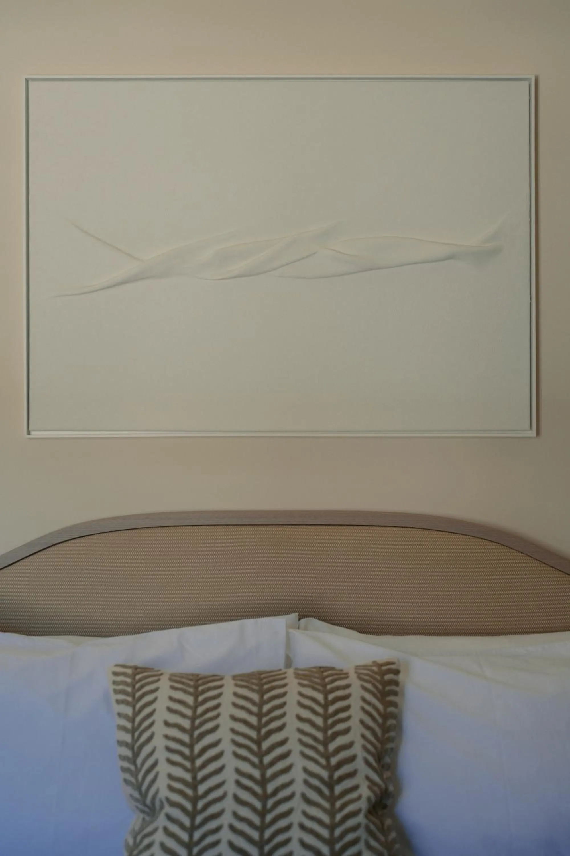 Bed in Black Rose Beach Suites