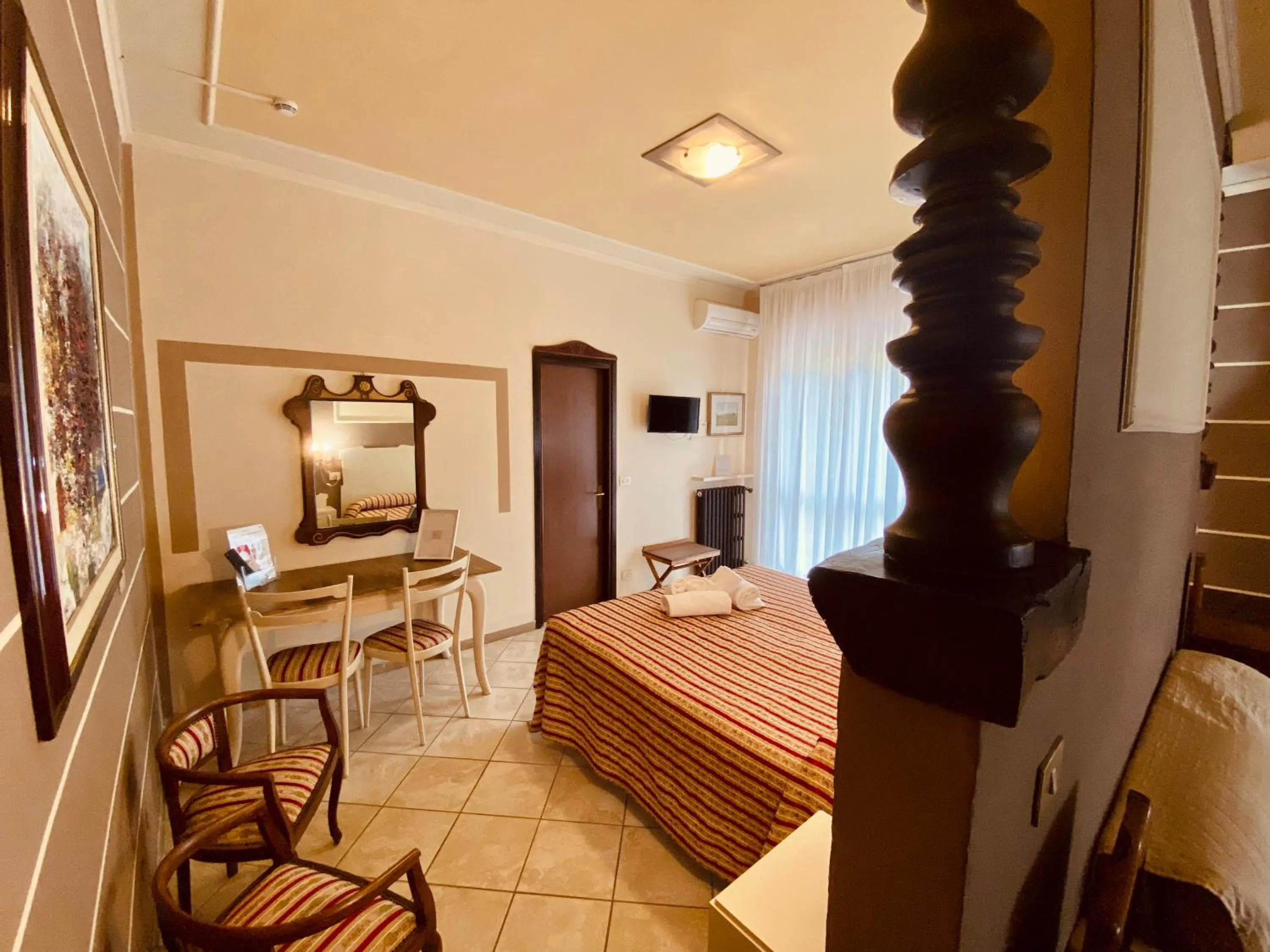 Bed in Art Hotel Pandos