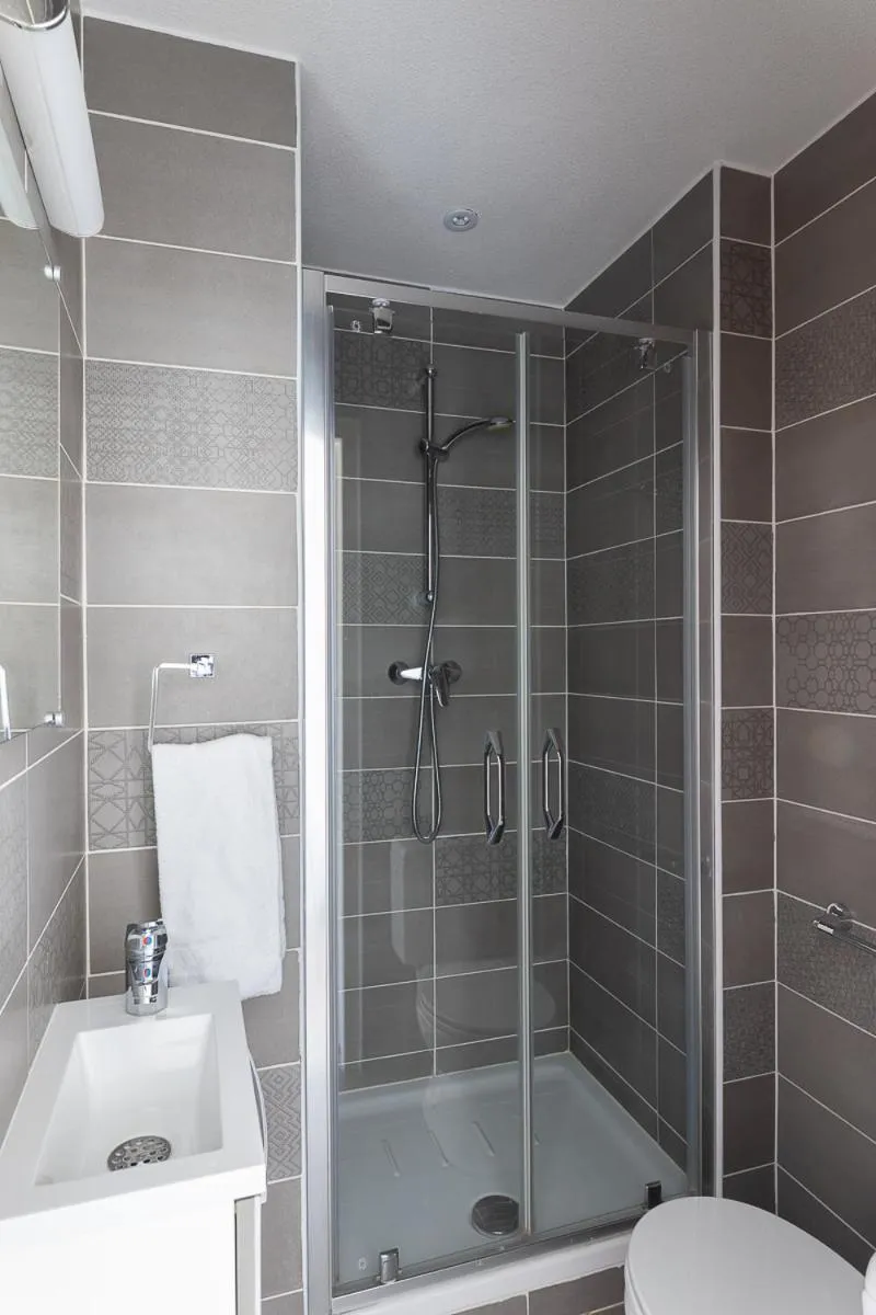 Shower in Appart Hotel Corte HR