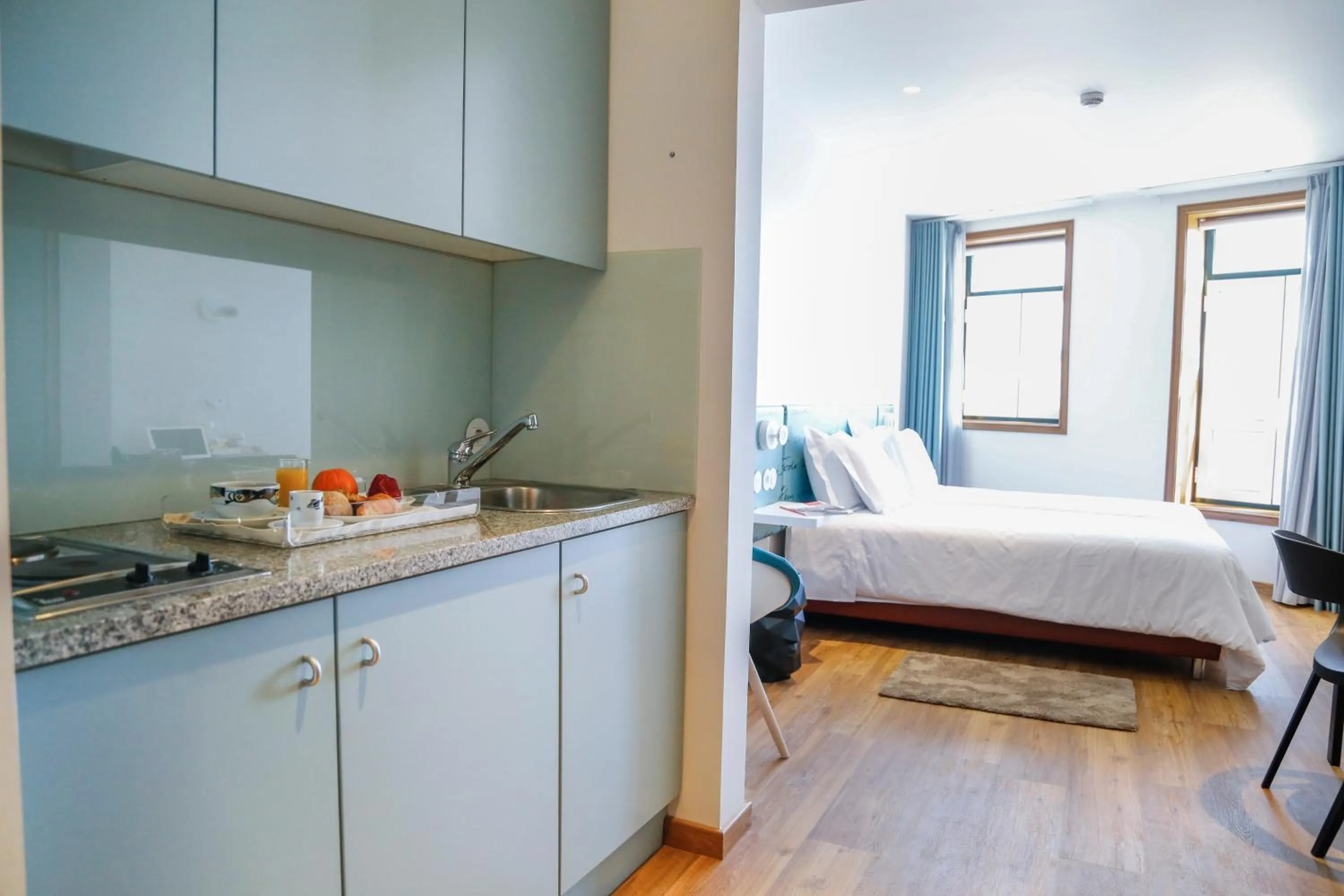 Kitchen or kitchenette, Bed in Hotel das Salinas by Alboi Group