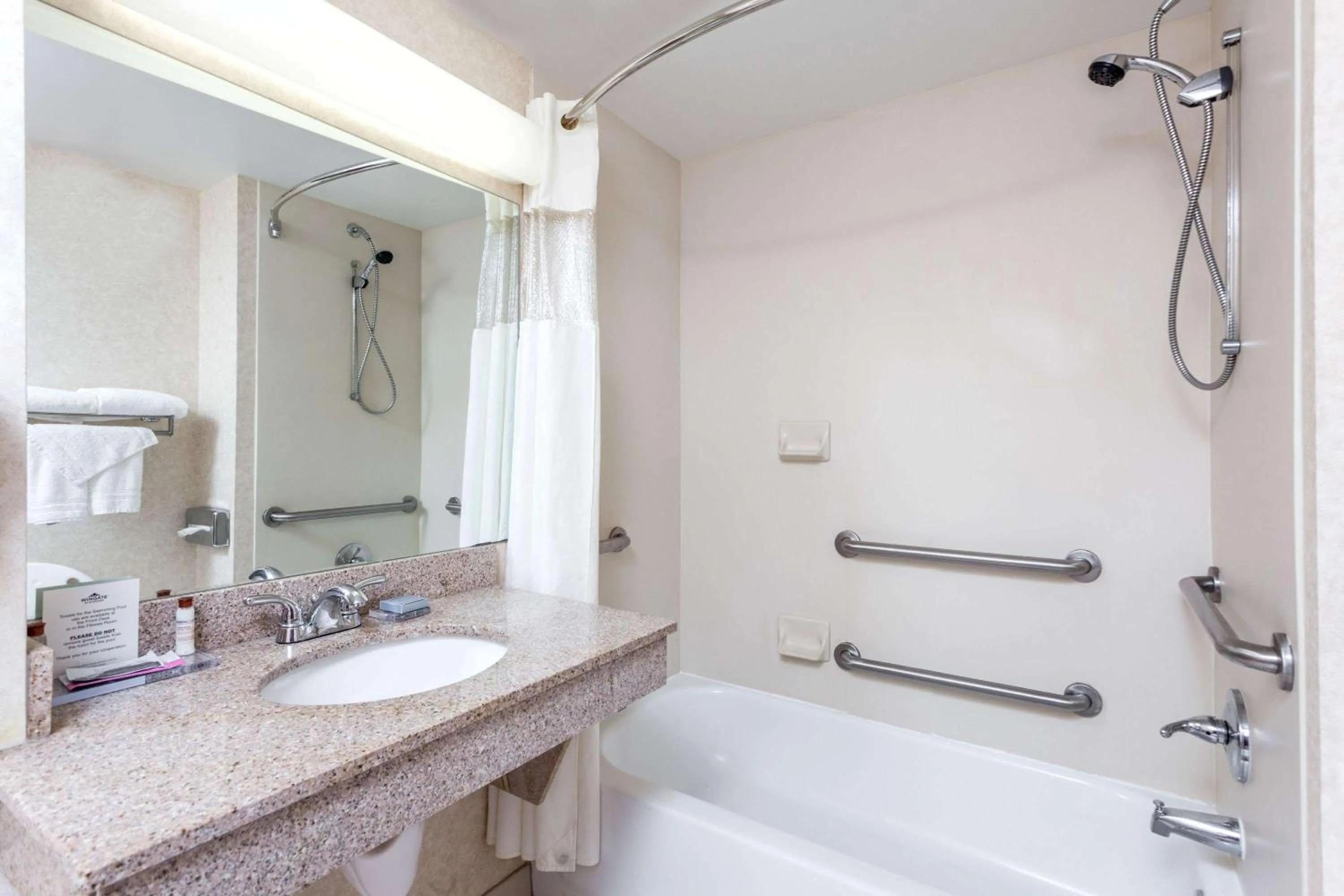 Bathroom in Wingate by Wyndham Atlanta/Six Flags Austell