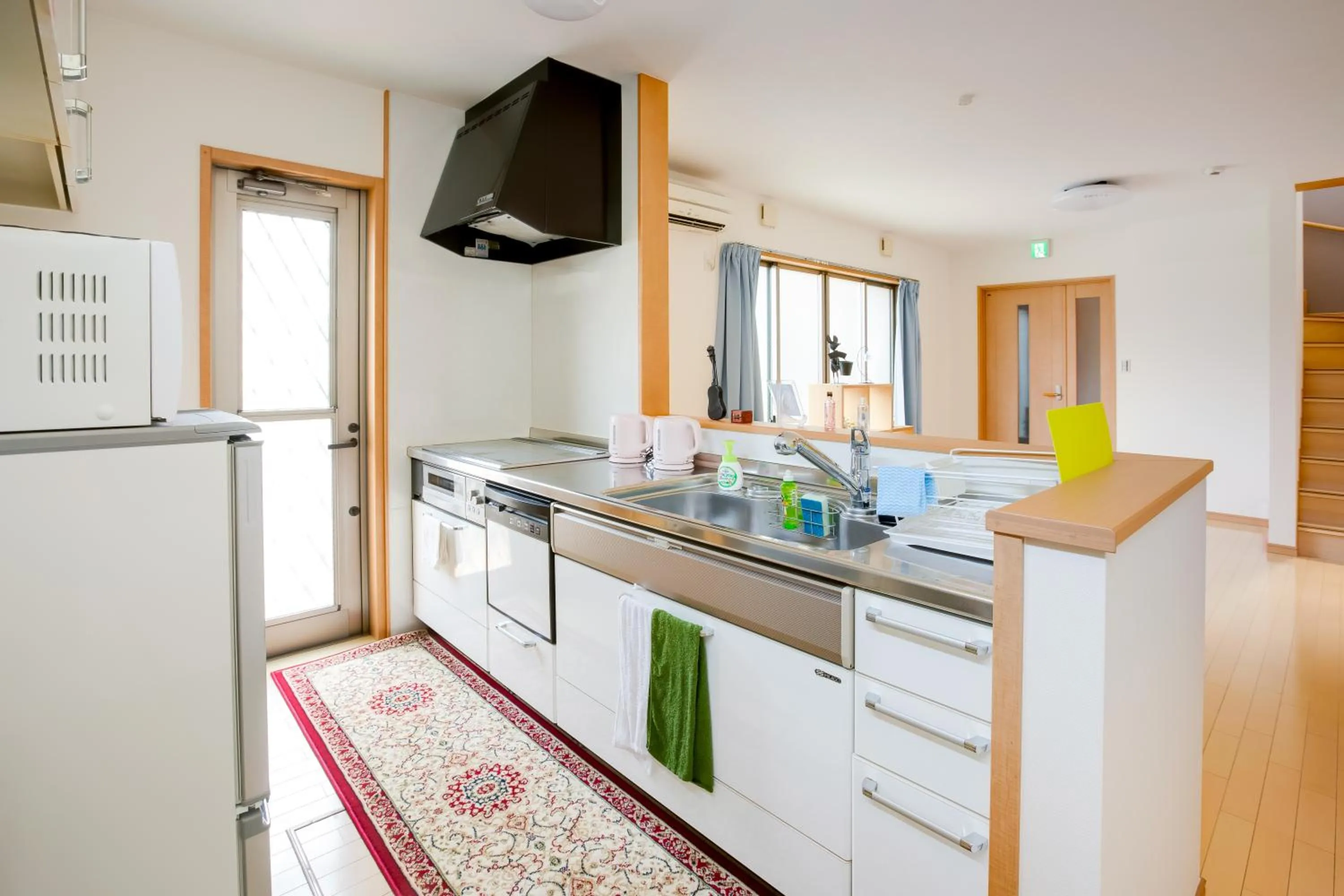 Communal kitchen in JIYUKA INN