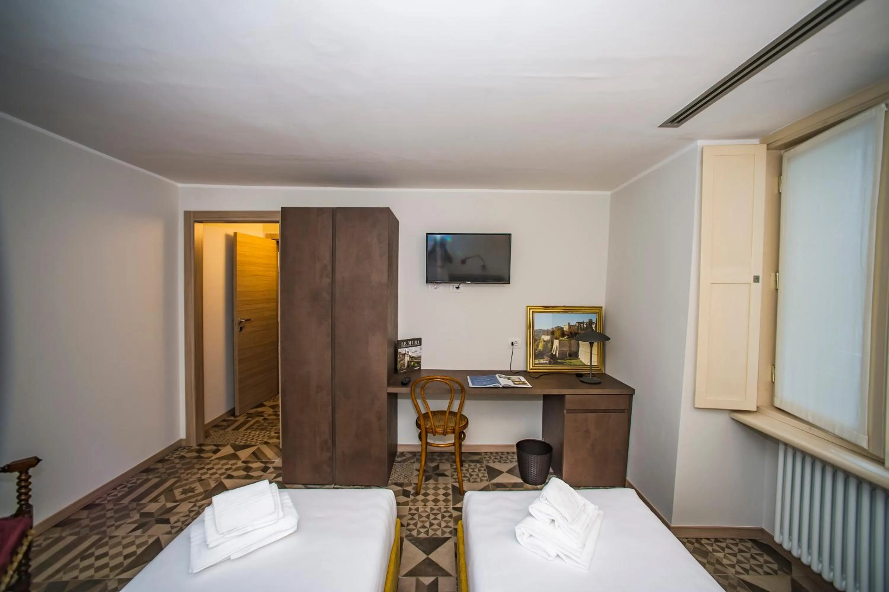 Photo of the whole room, Bed in Locanda Mimmo