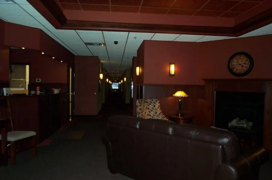 Communal lounge/ TV room in Americas Best Value Inn Big Lake Becker