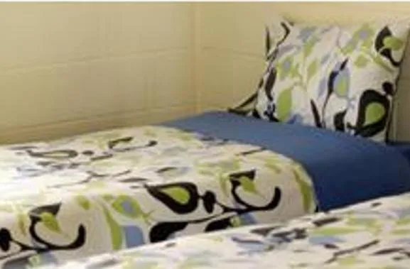 Bed in Broadway Motel & Miro Court Villas