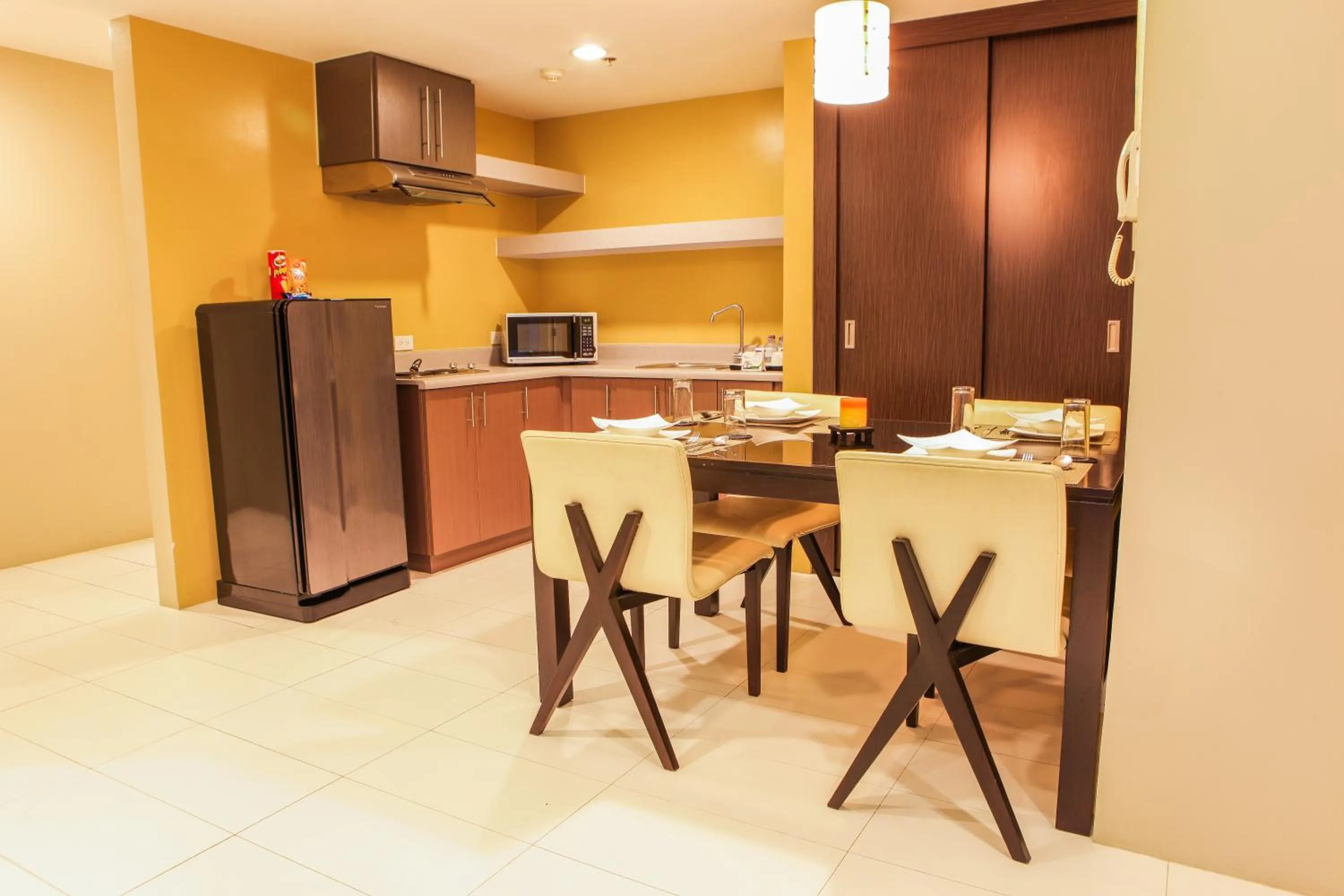 Kitchen or kitchenette in The Exchange Regency Residence Hotel Managed by HII