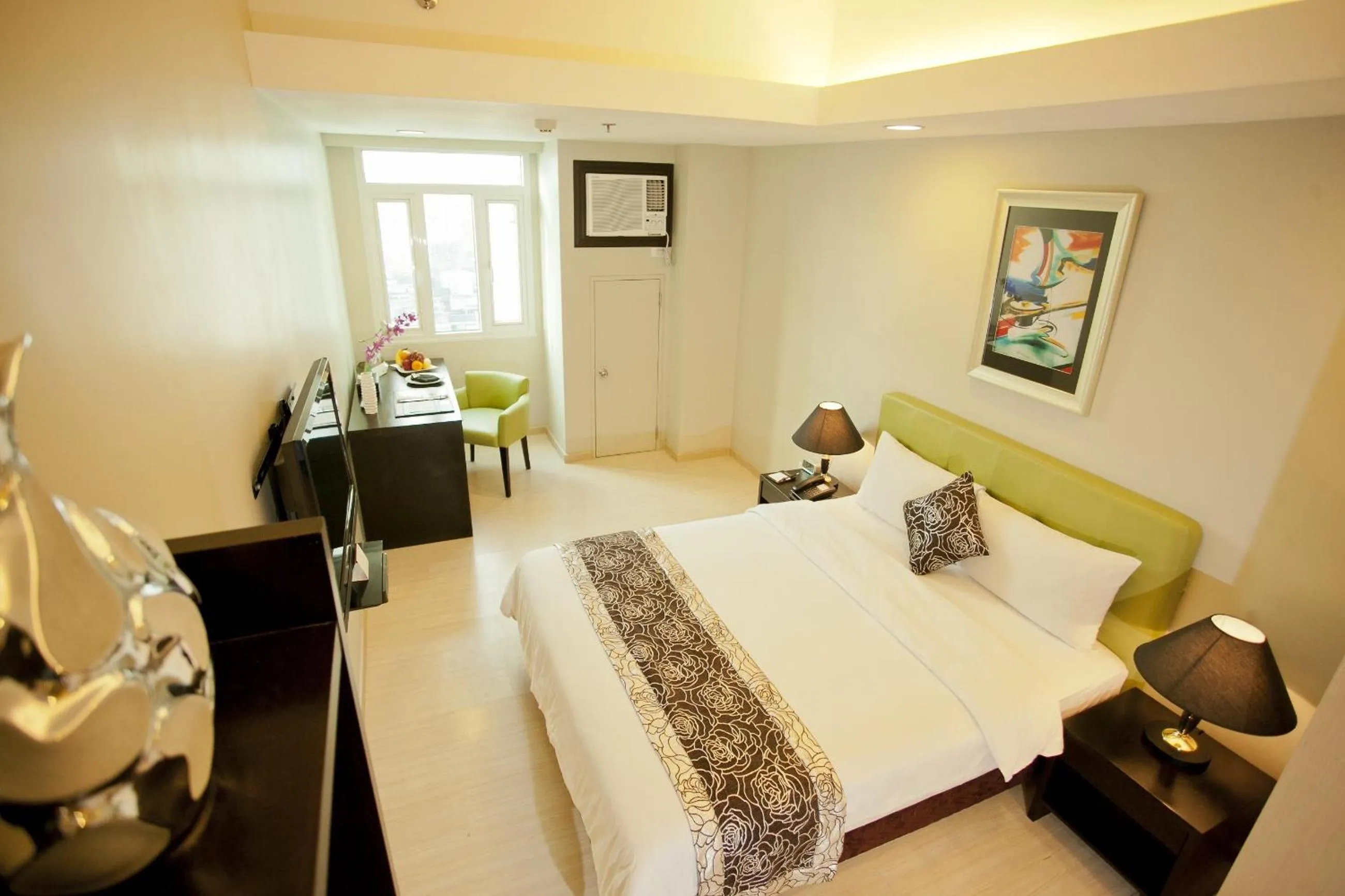 Photo of the whole room, Bed in The Exchange Regency Residence Hotel Managed by HII