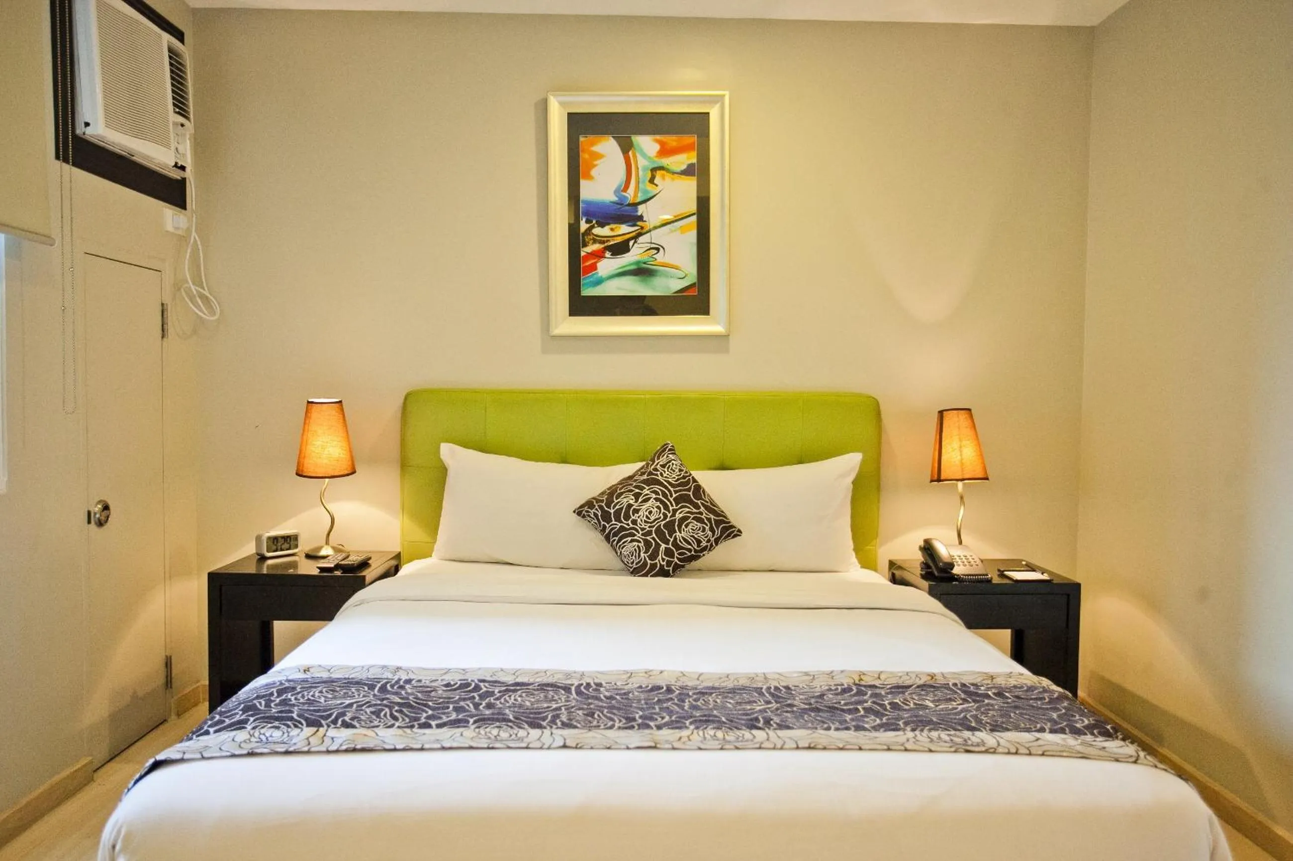 Bed in The Exchange Regency Residence Hotel Managed by HII