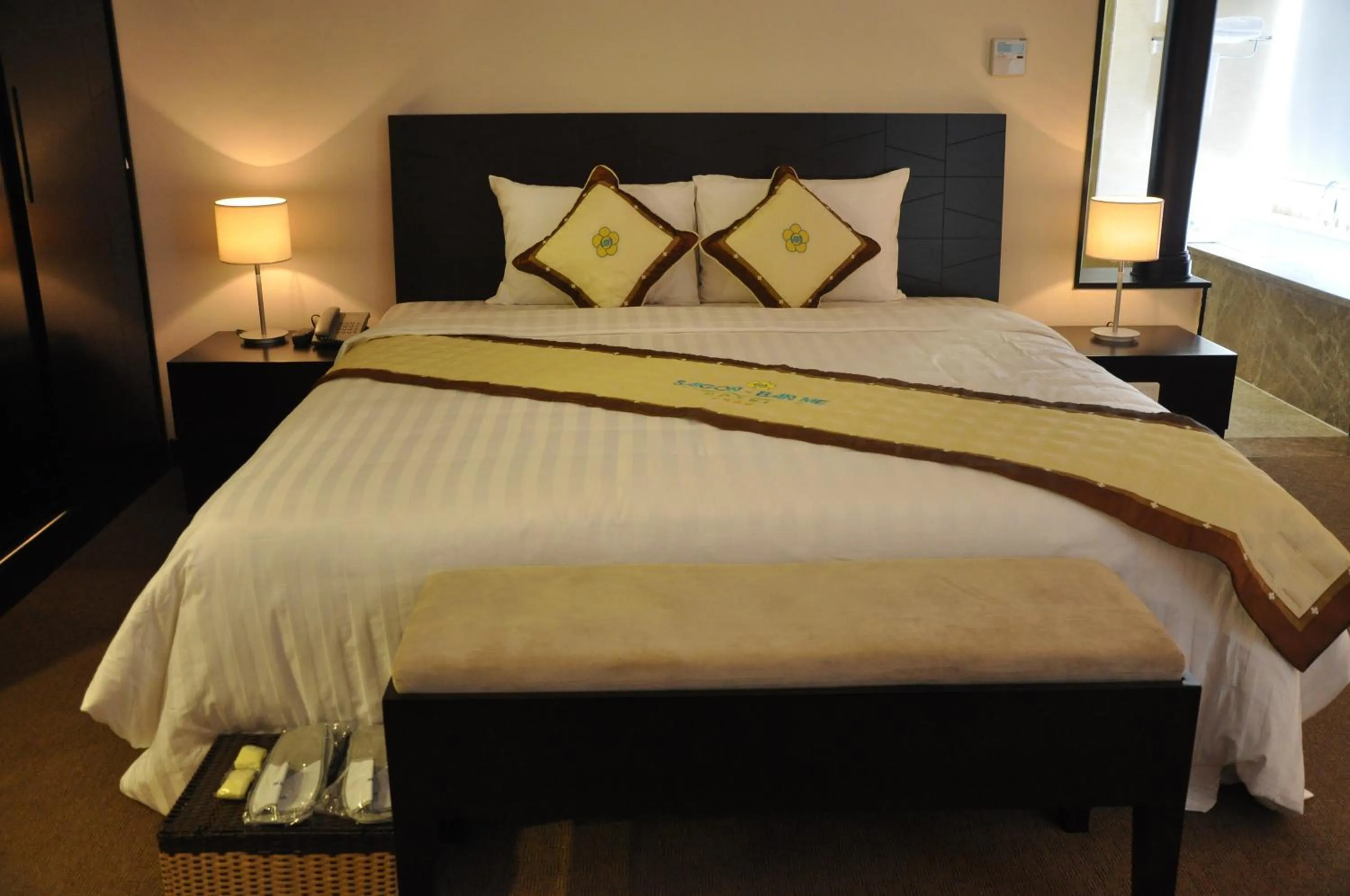 Bed in Sai Gon Ban Me Hotel