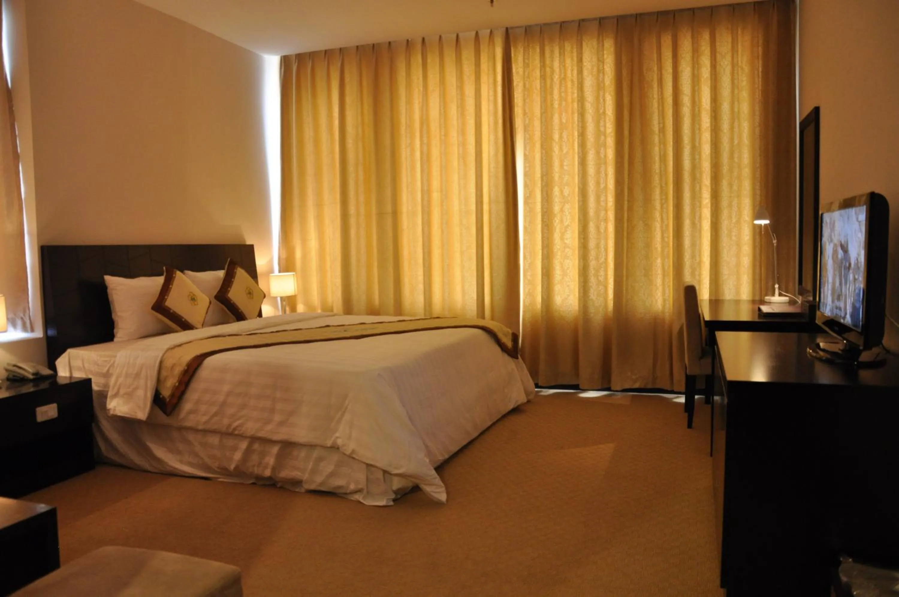 Bed in Sai Gon Ban Me Hotel