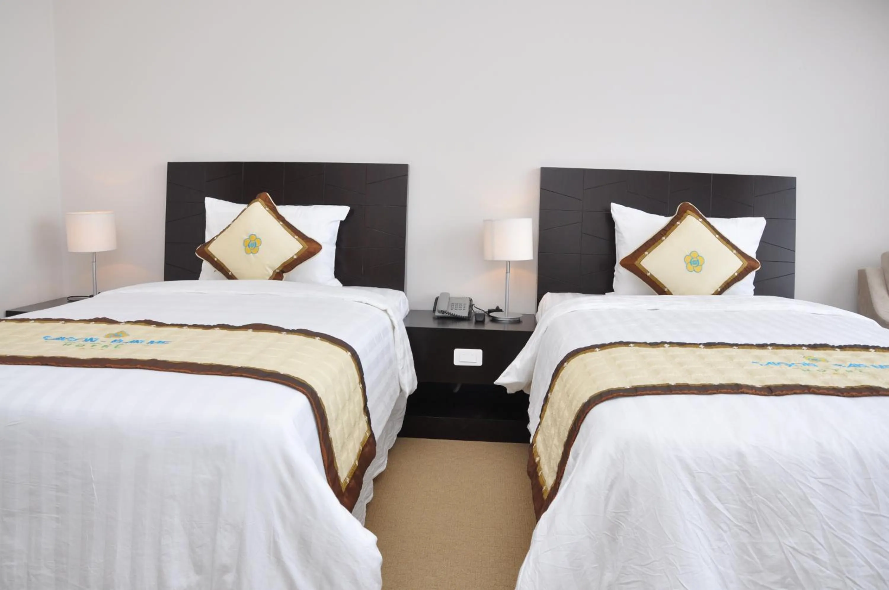 Bed in Sai Gon Ban Me Hotel