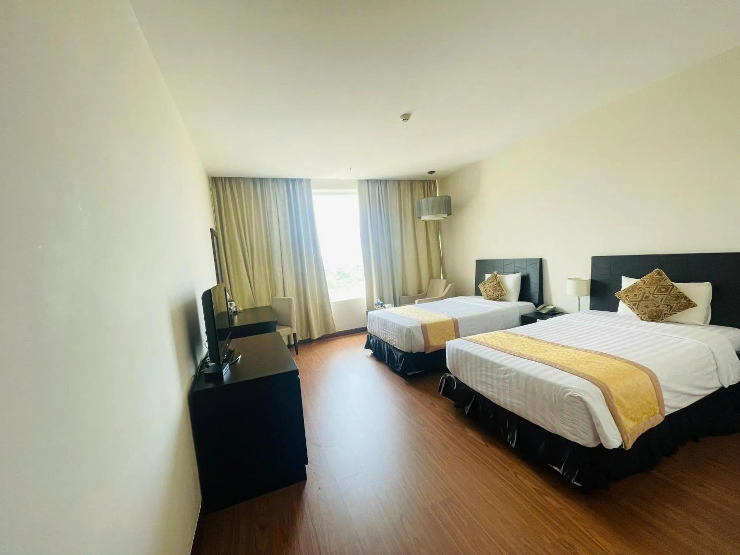 Photo of the whole room, Bed in Sai Gon Ban Me Hotel