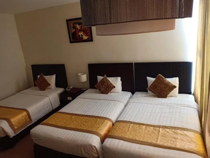 Bed in Sai Gon Ban Me Hotel