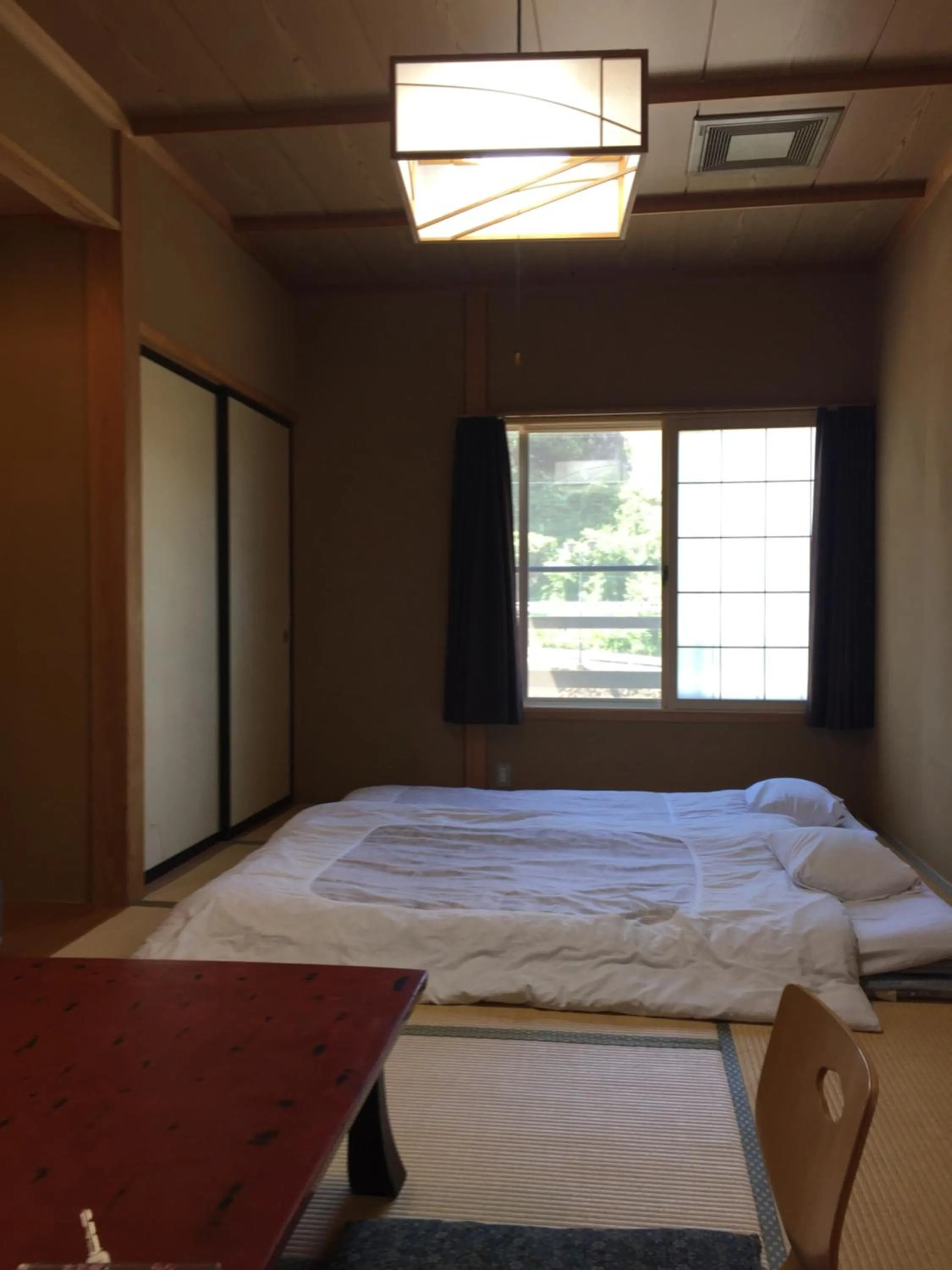 View (from property/room), Bed in Daymaruya Ryokan