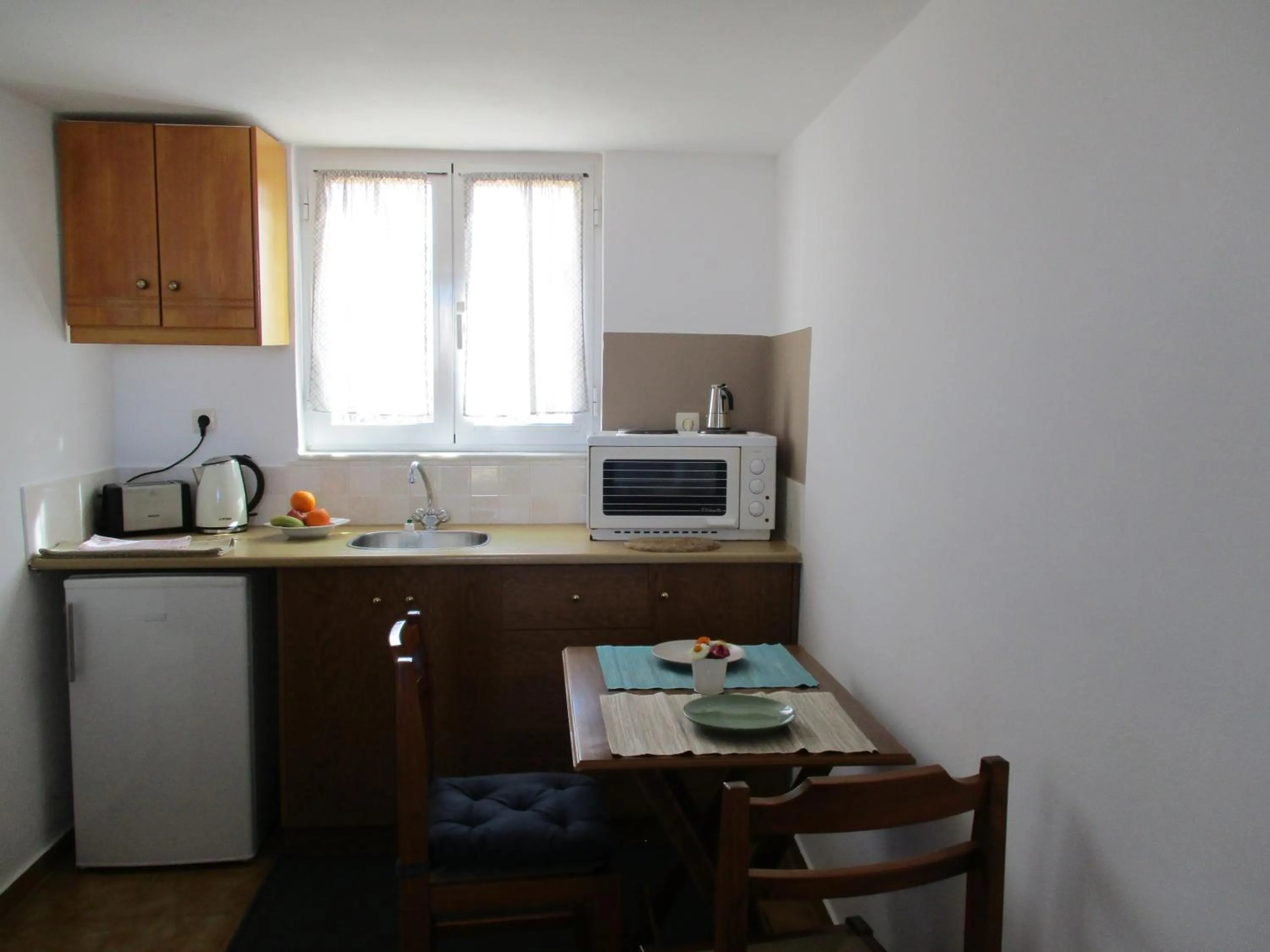 Kitchen or kitchenette in Theodosia Studios