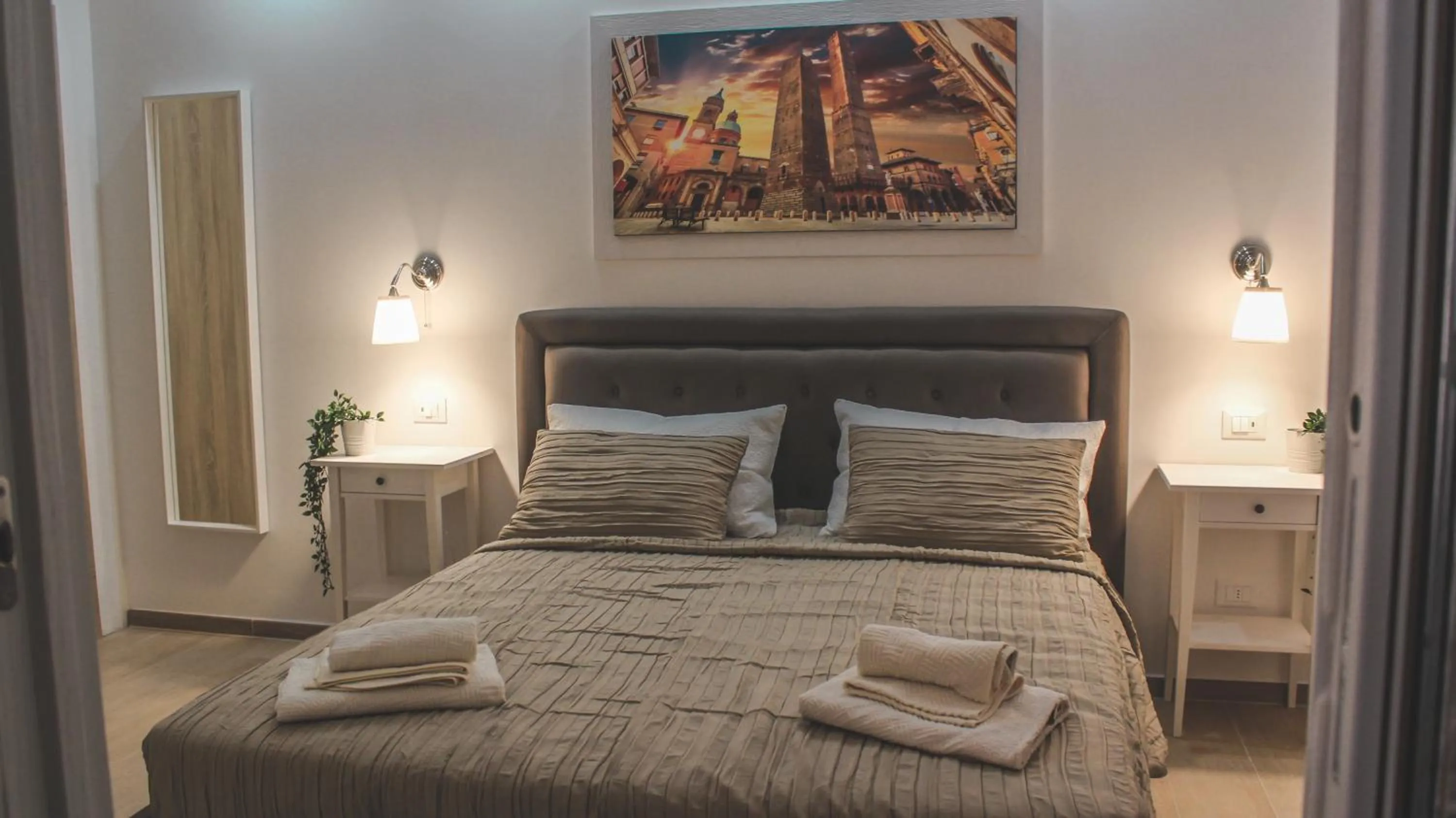 Photo of the whole room, Bed in B&B Bologna Station