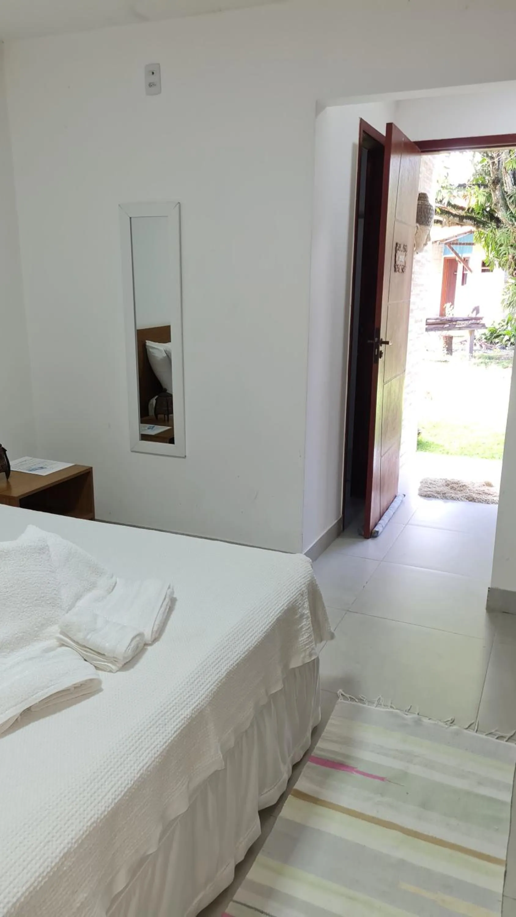 Bed in Pousada Jeito Bom de Viver