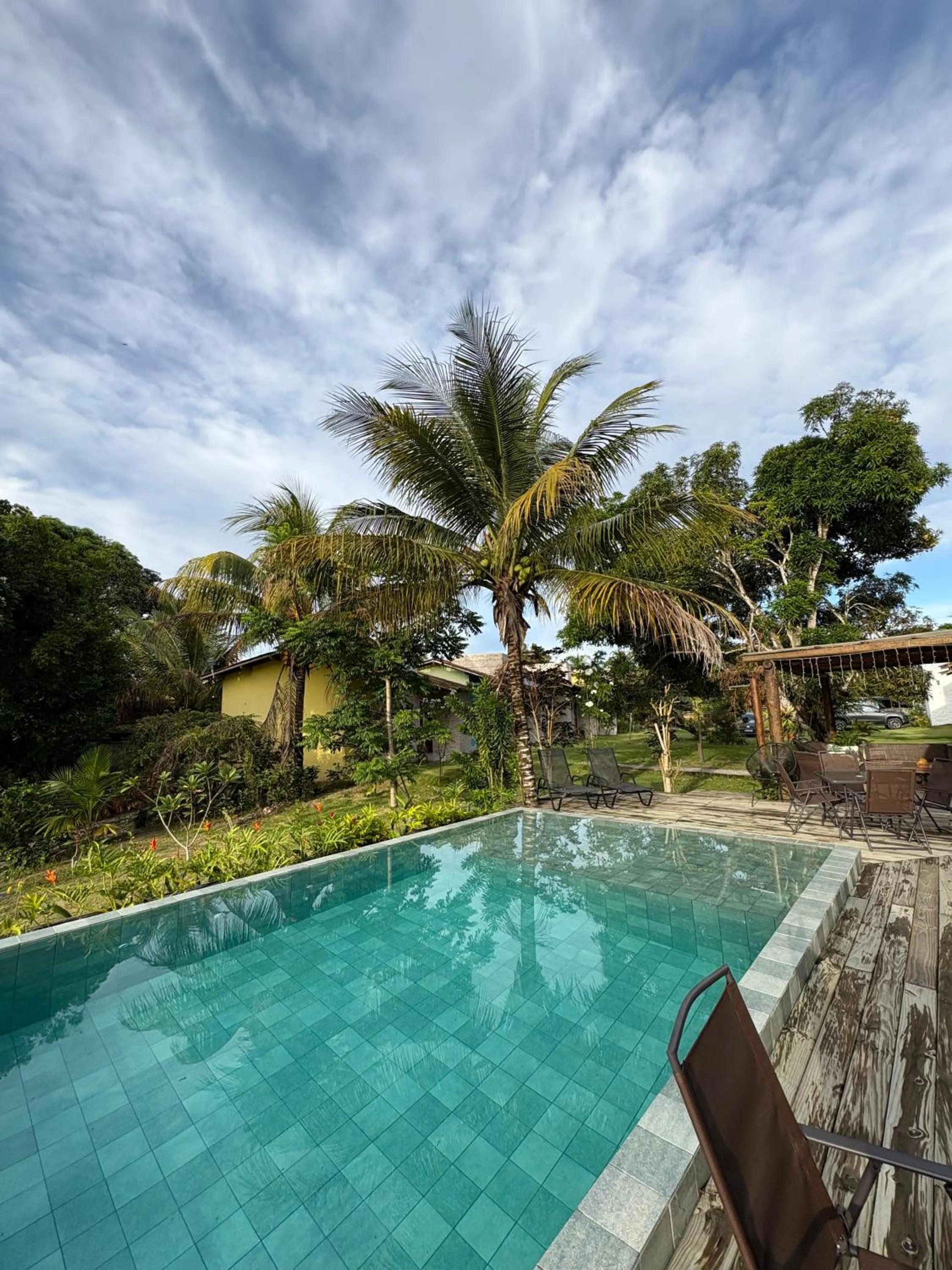 Swimming pool in Pousada Jeito Bom de Viver