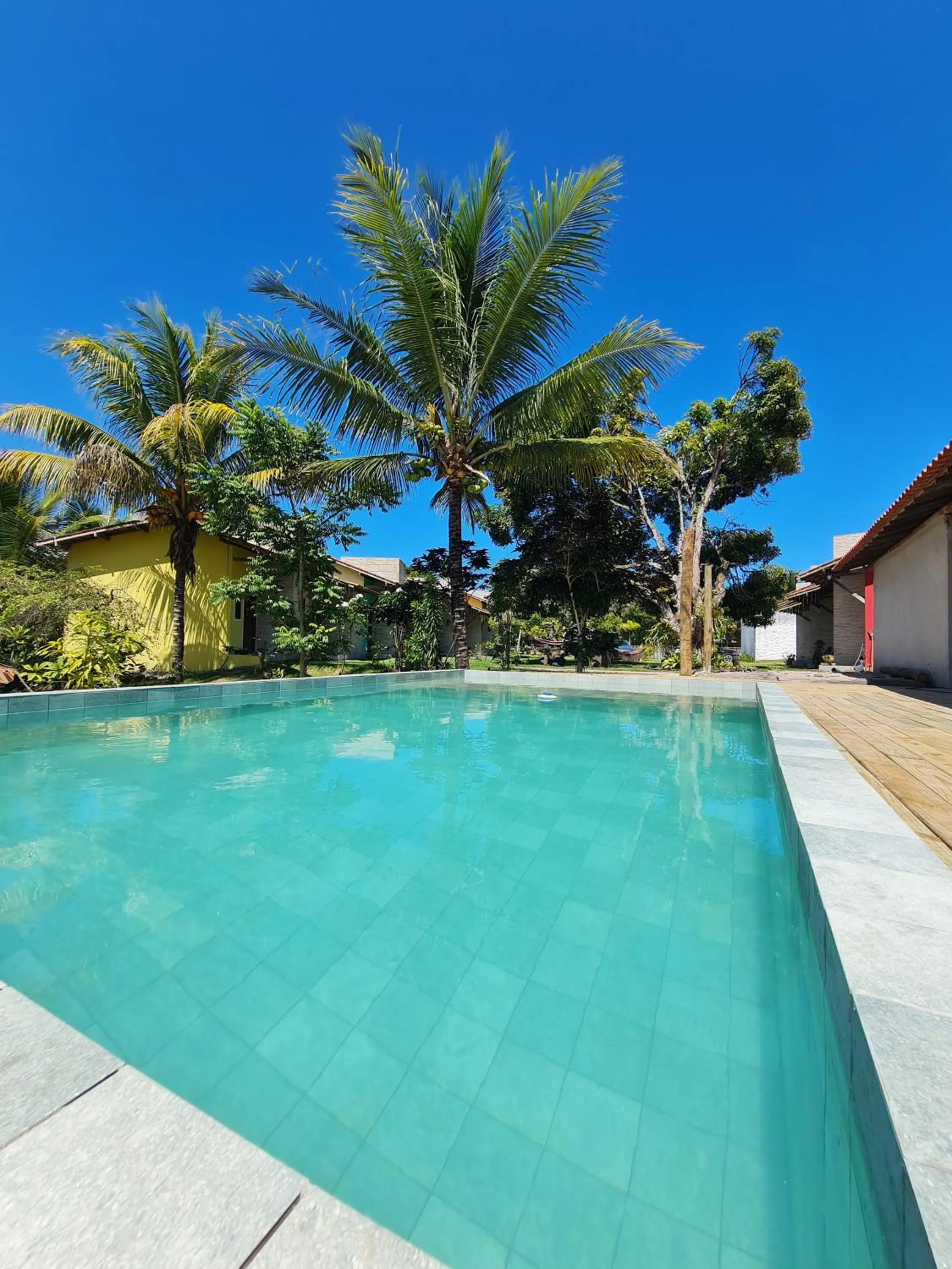 Swimming pool in Pousada Jeito Bom de Viver