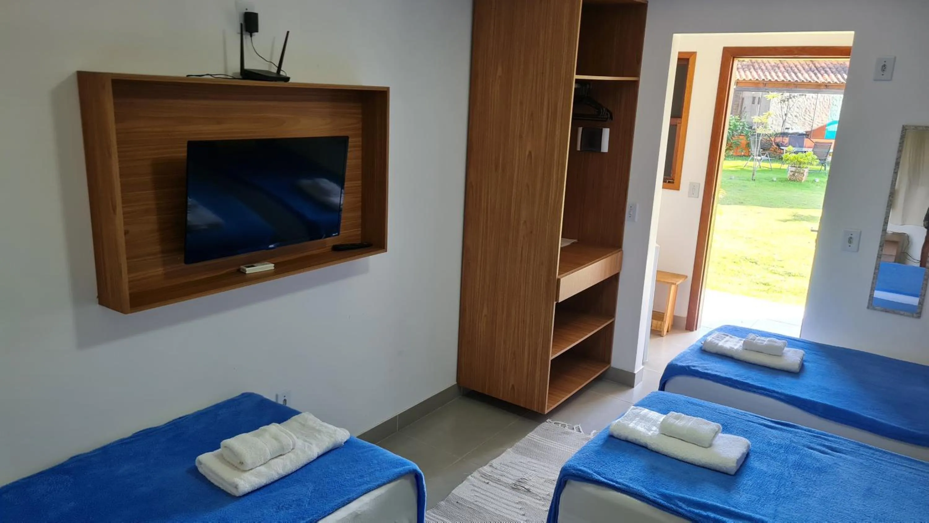 Bed in Pousada Jeito Bom de Viver