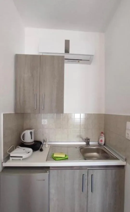 Kitchen or kitchenette in Afroditi Hotel