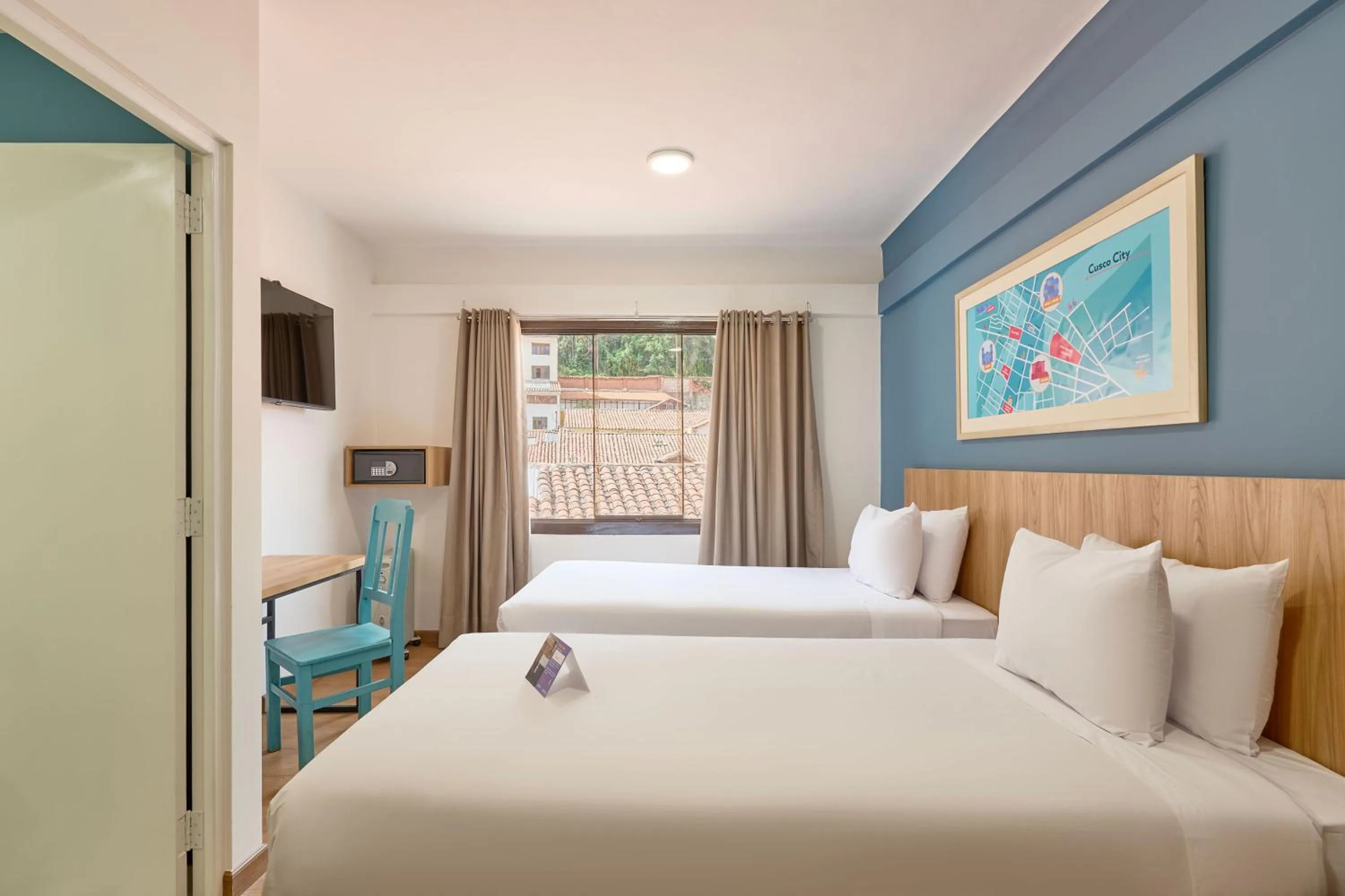 Photo of the whole room, Bed in Centro by Casa Andina Cusco Saphi