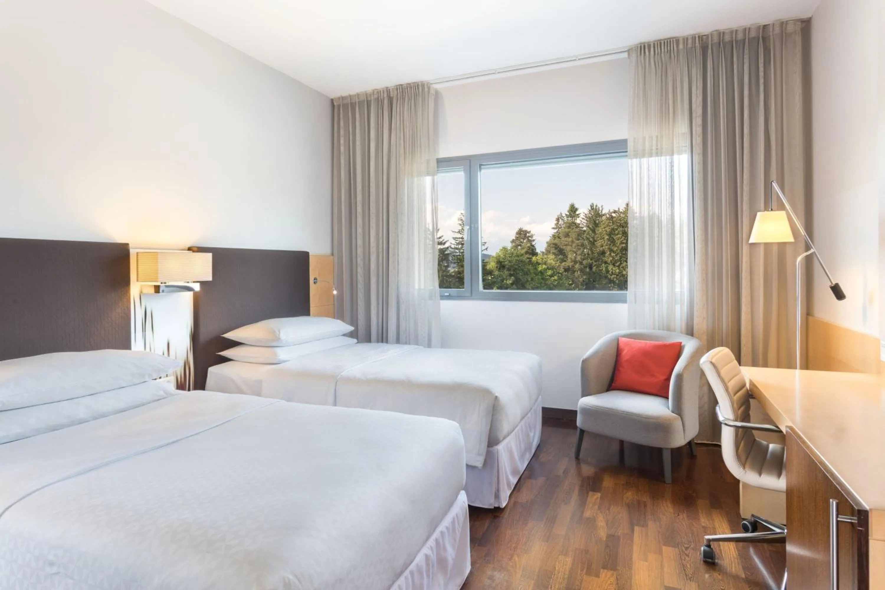 Photo of the whole room, Bed in Four Points by Sheraton Ljubljana Mons